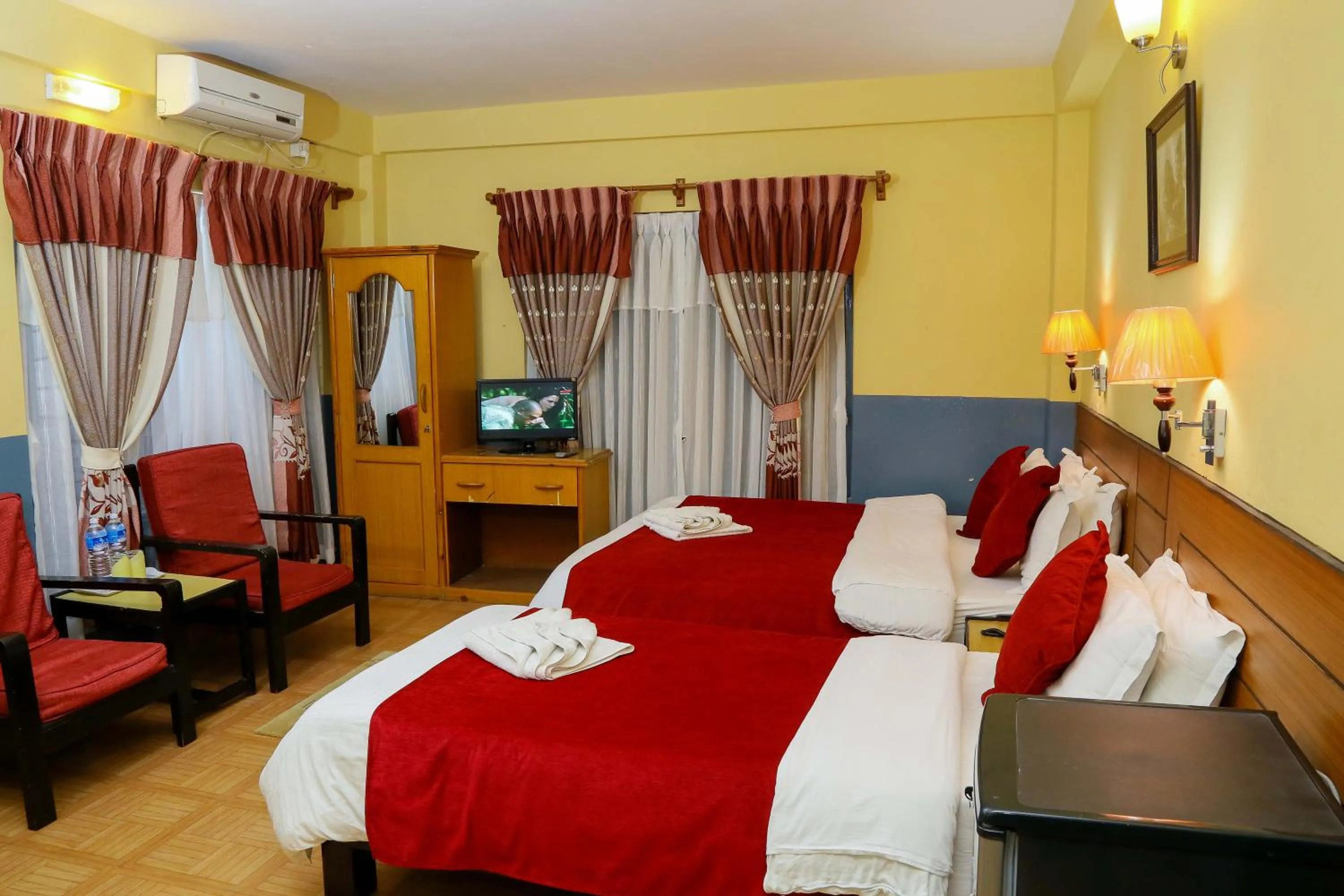 Deluxe Family Room with Balcony in Hotel Silver Oaks Inn