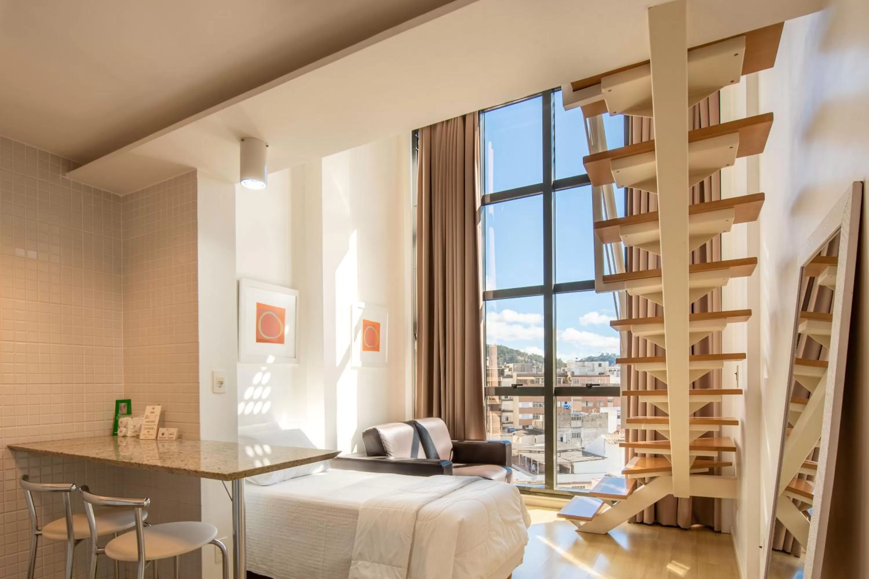 Executive Apartment with stairs inside the room in Hotel Habitare