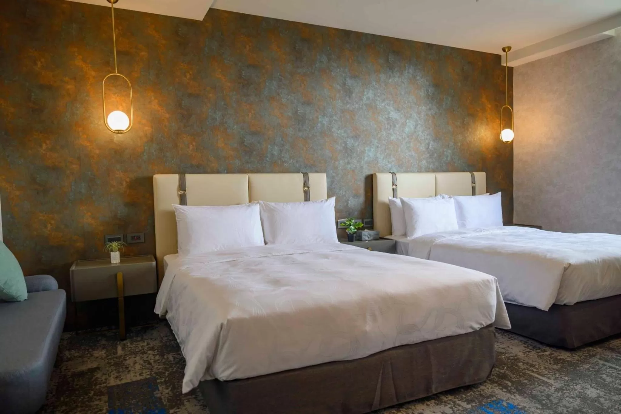 Standard Quadruple Room in Tenz Go Hotel