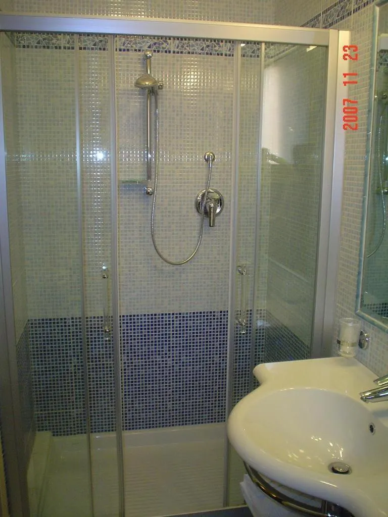 Quadruple Room in Hotel Dina