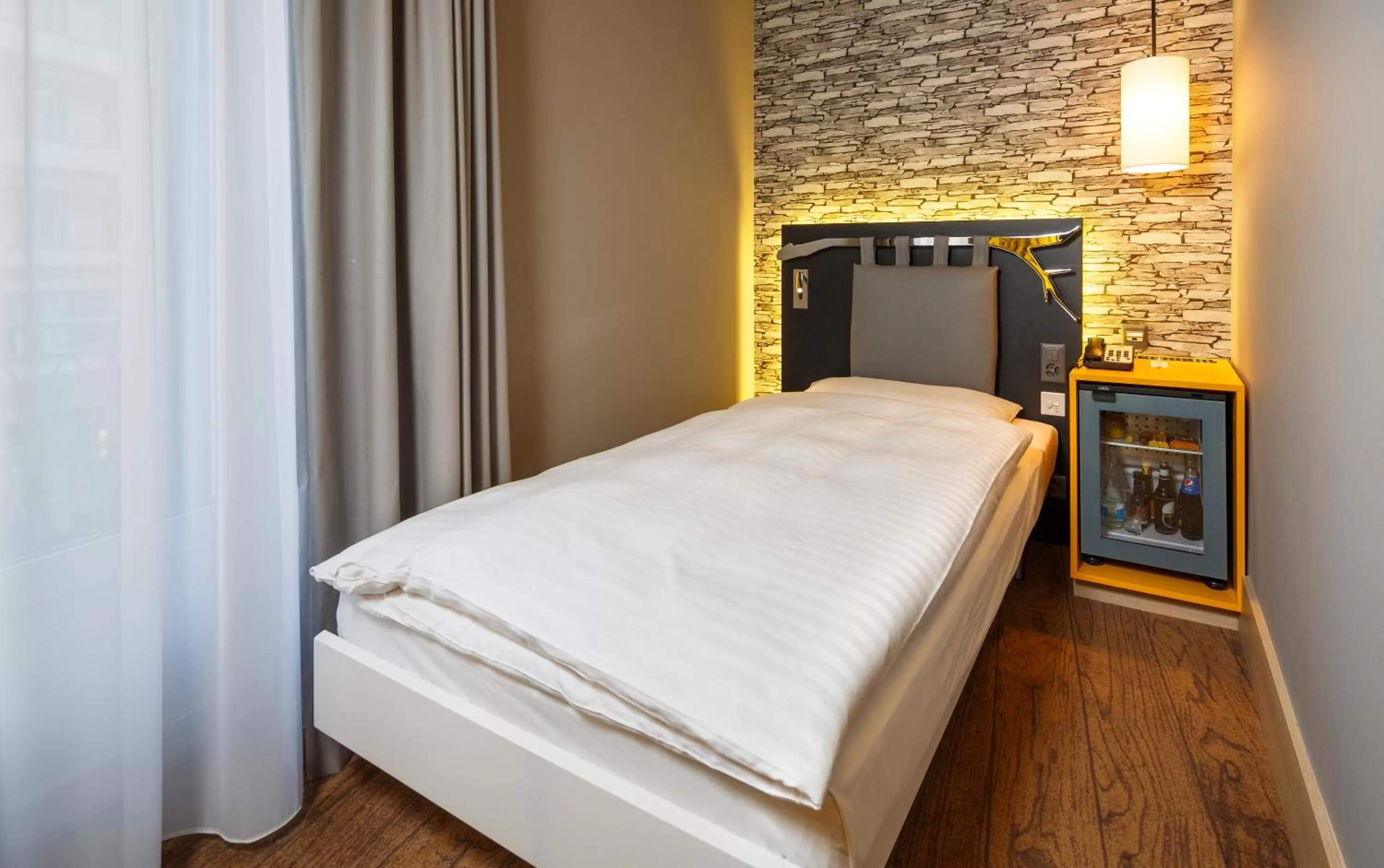 Single Room with Street View in Swiss Wine by Fassbind