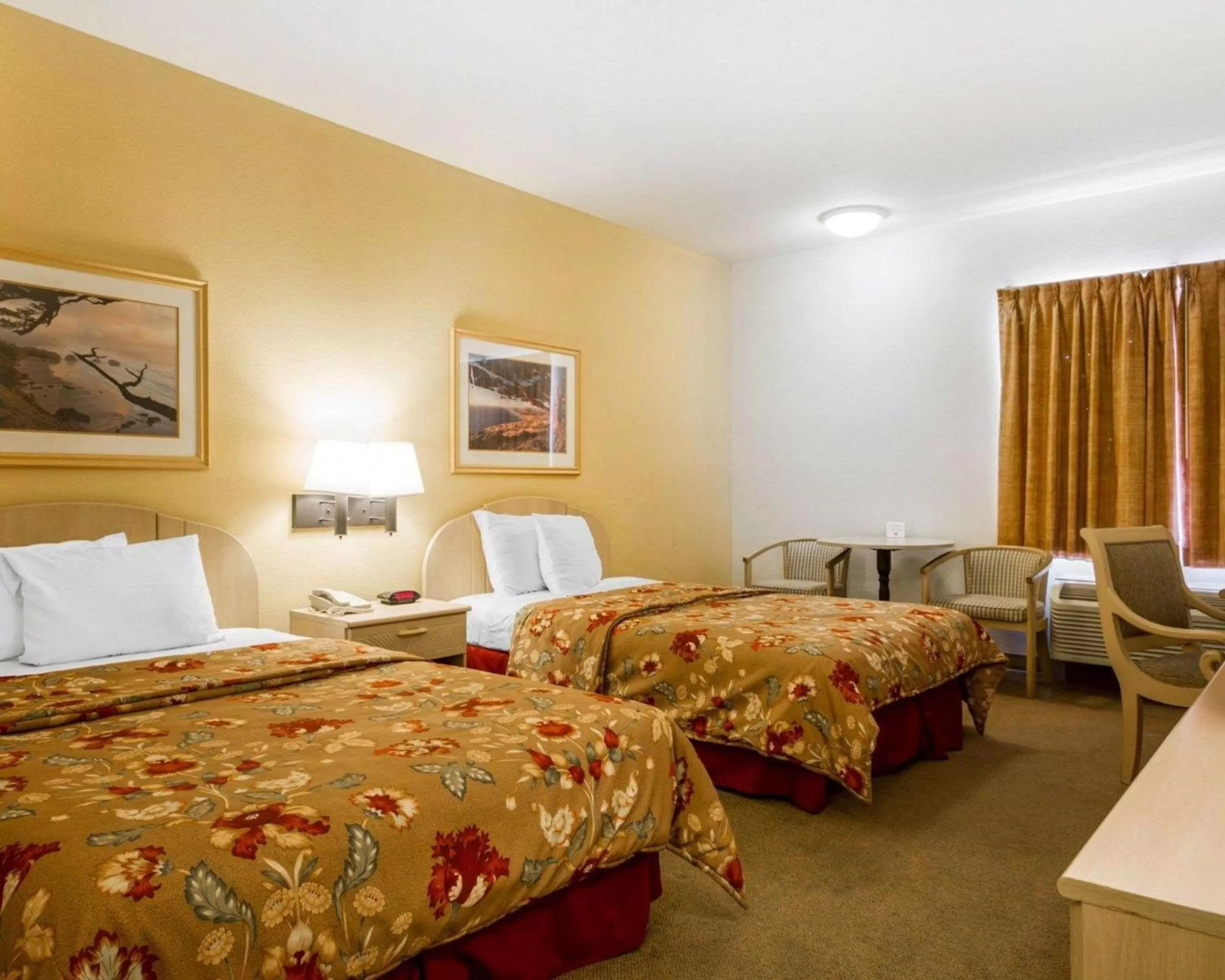 Queen Room with Two Queen Beds - Non-Smoking in Rodeway Inn