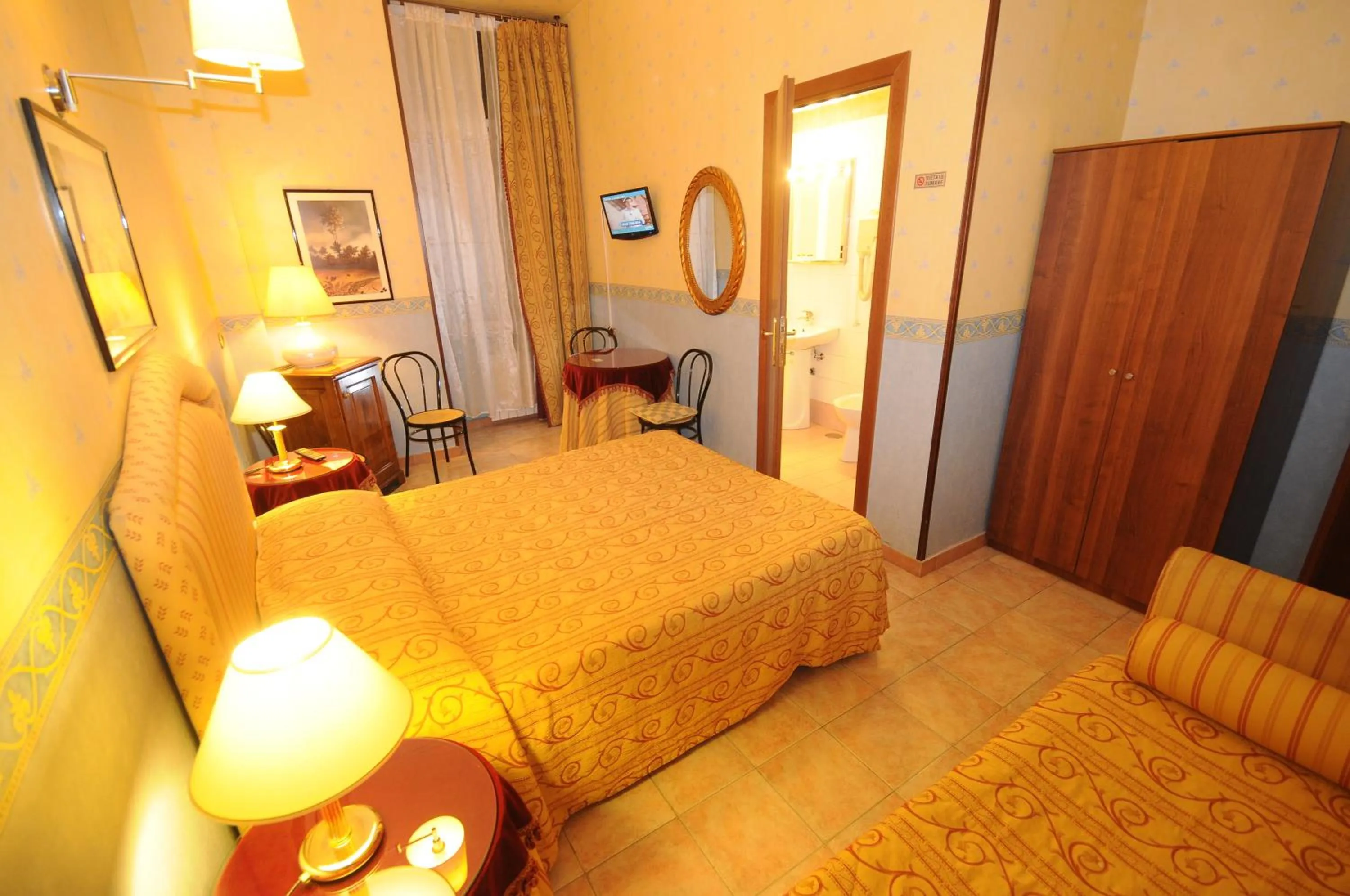 Quadruple Room in Hotel Sweet Home