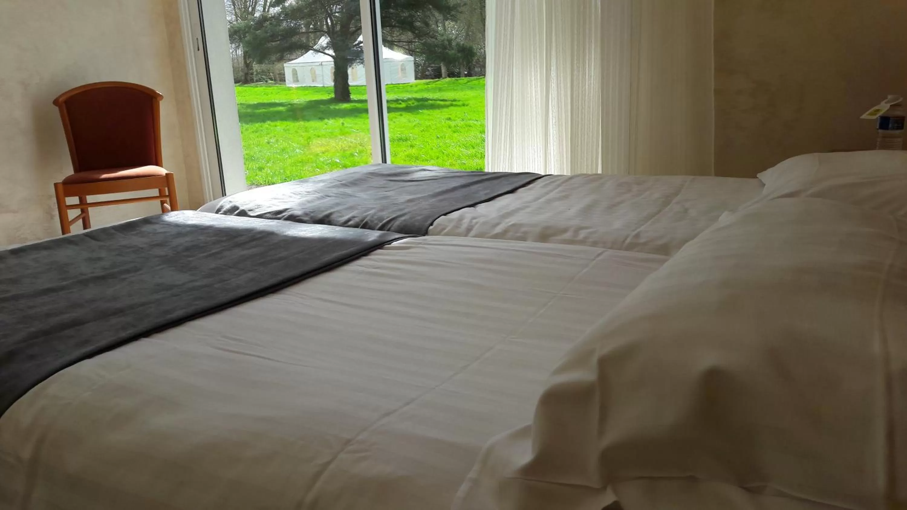 Twin Room with Garden View in Logis - Hostellerie Le Chatel Nangis