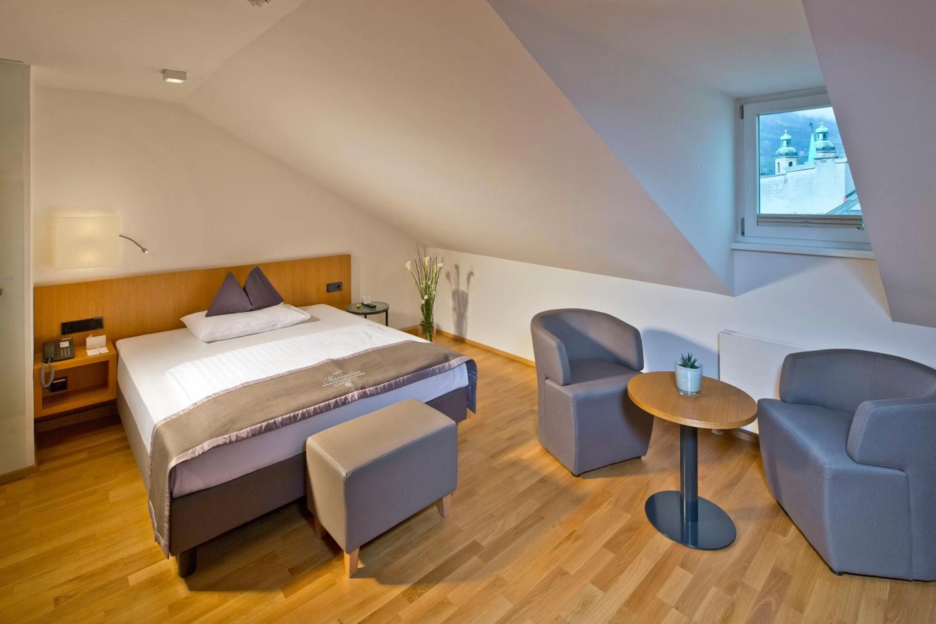 Attic Room with Air Conditioning in Hotel Maximilian - Stadthaus Penz