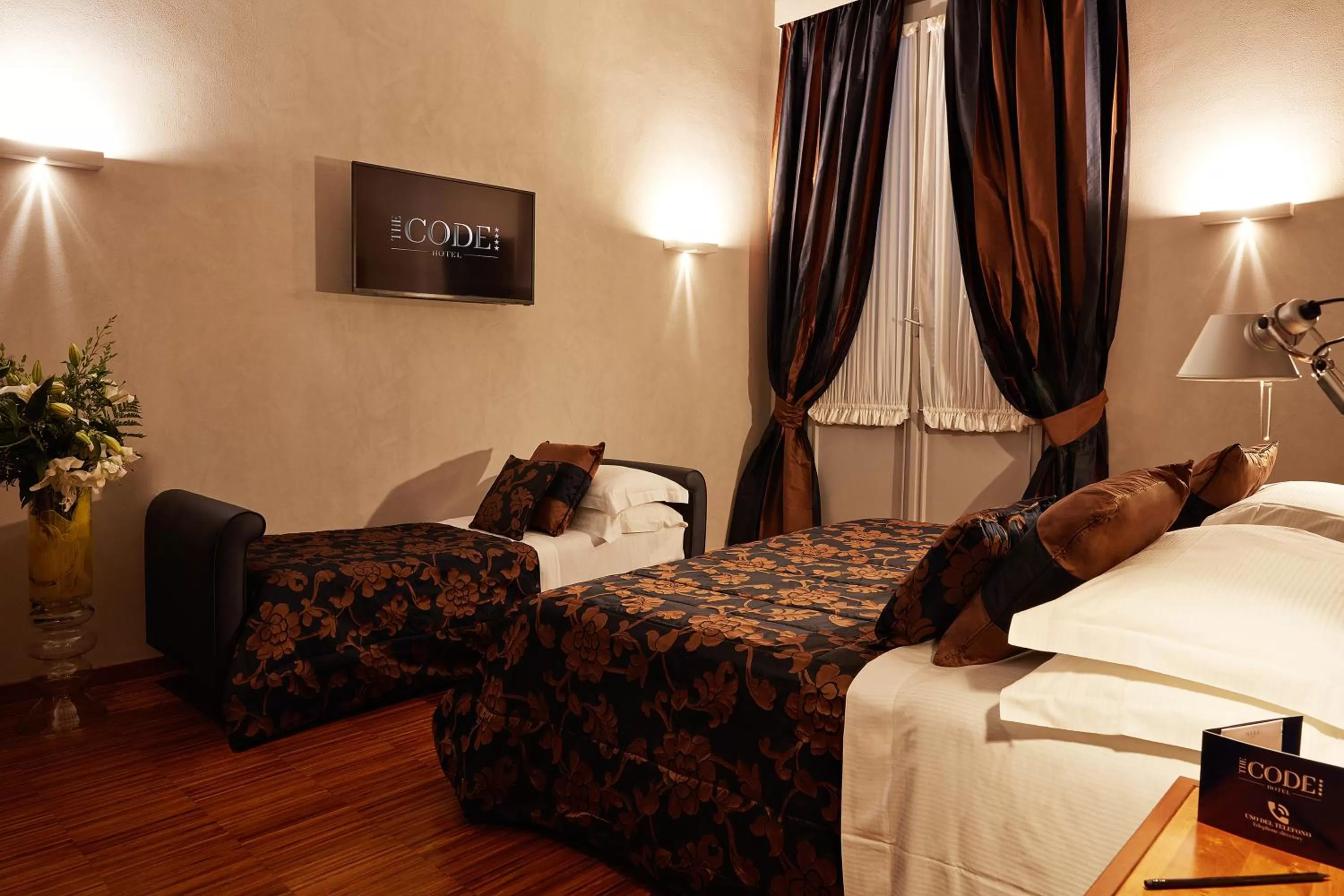 Classic Triple Room in The Code Hotel