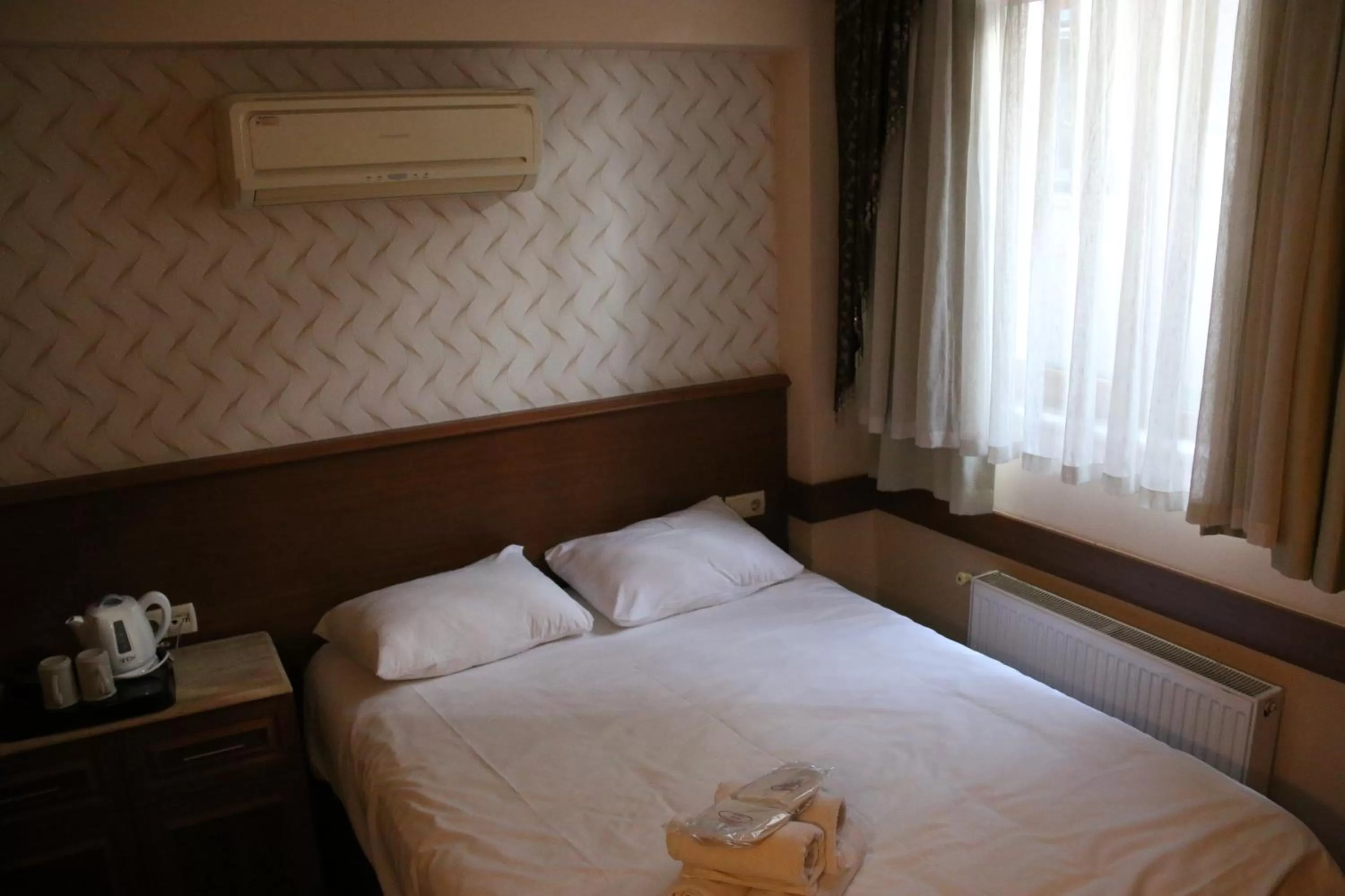 Basement Single Room in Grand Peninsula Hotel