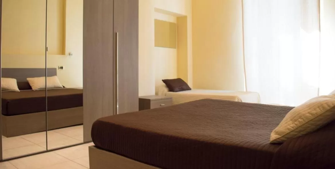 Quadruple Room with Balcony in Guerrini Hotel