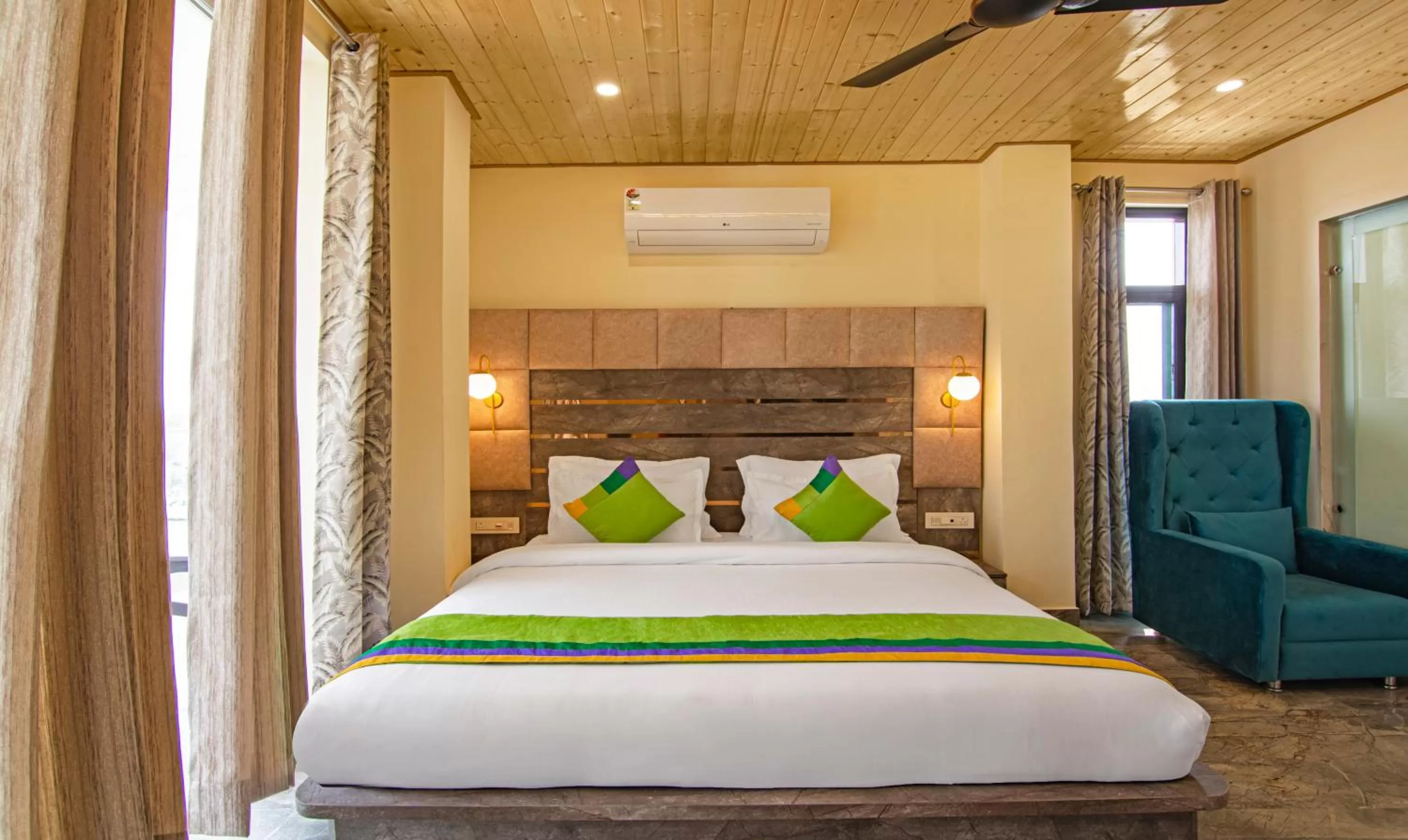 Spacious Premium Room with Mountain View in Treebo Ortus Residency