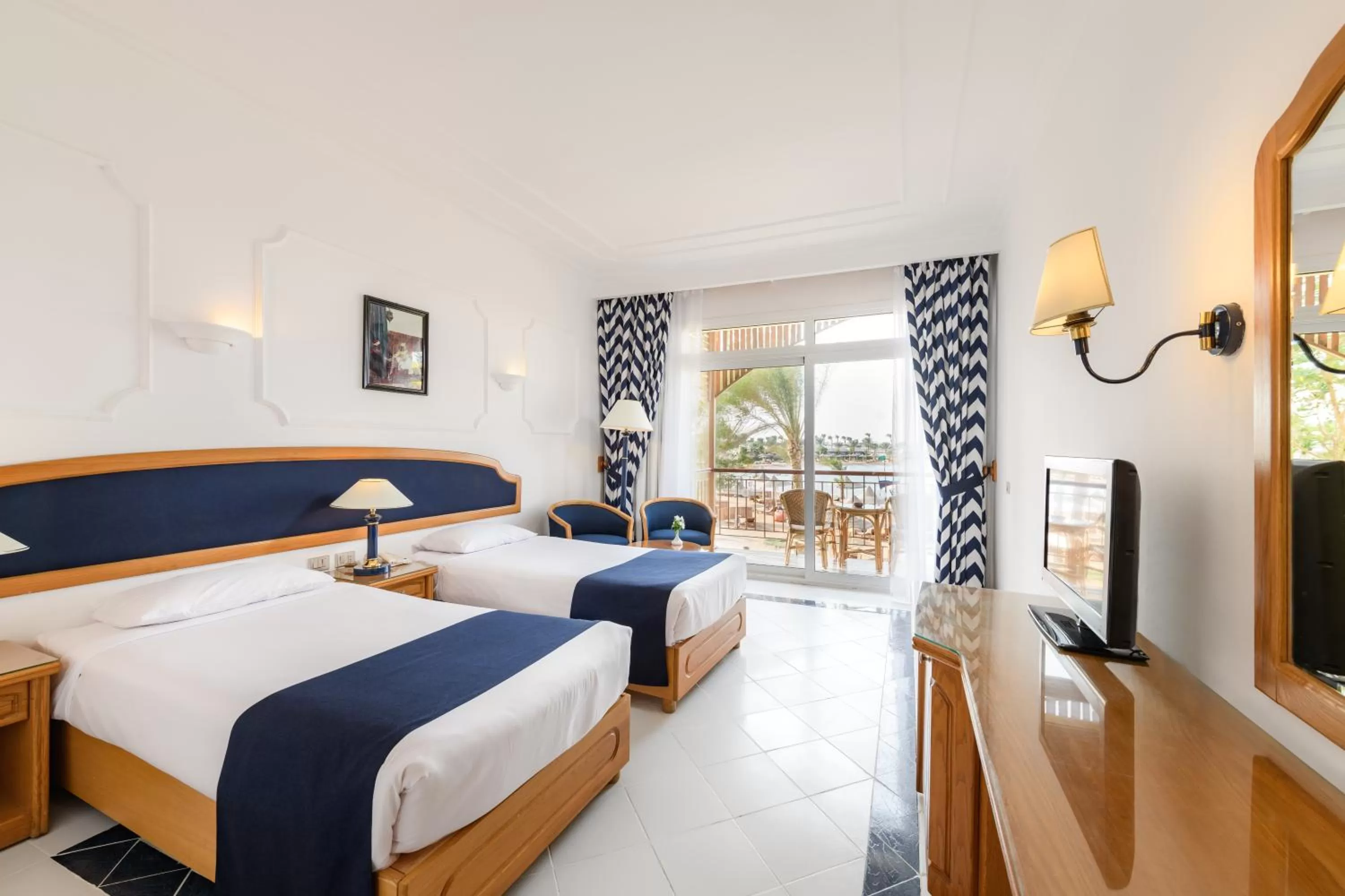 Standard Triple Room with Garden View in Desert Rose Resort