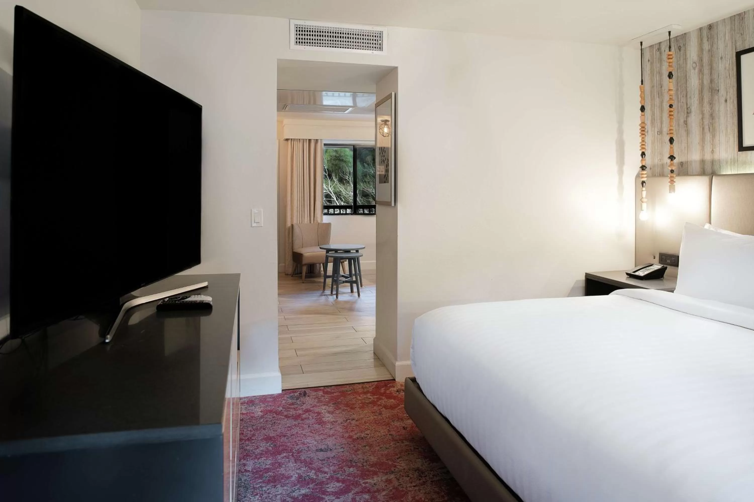 Deluxe King Room with Single Sofa Bed - Riverside in Cliffrose Springdale, Curio Collection By Hilton