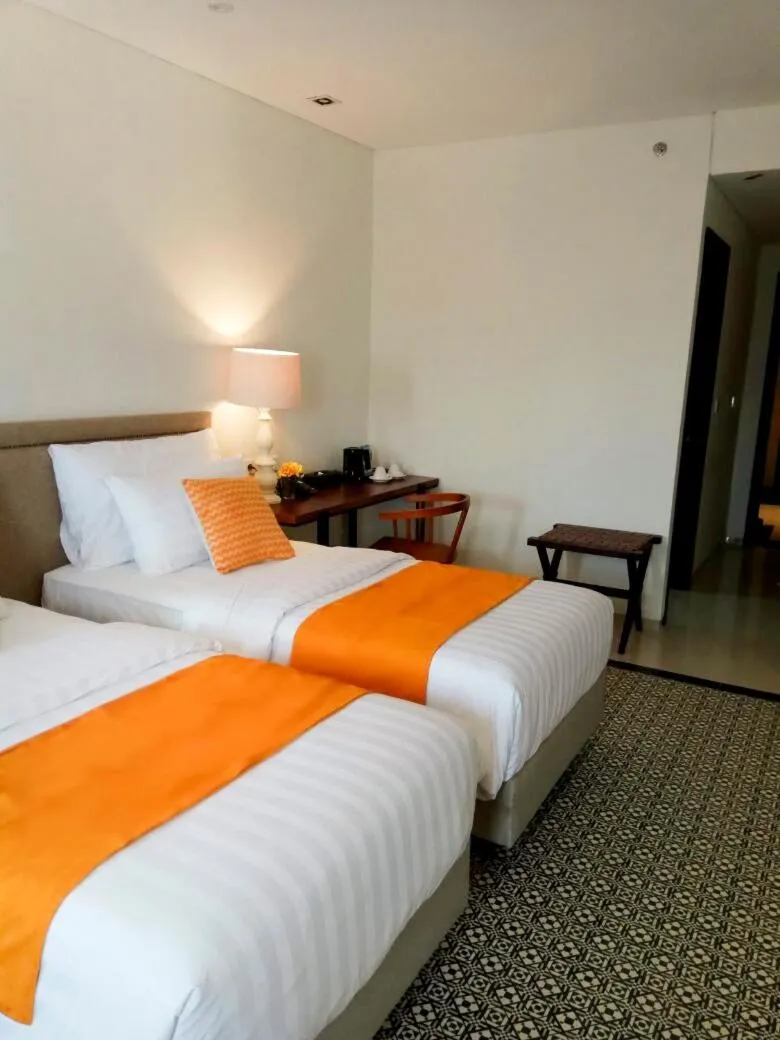 Bed in M Hotel Sorong