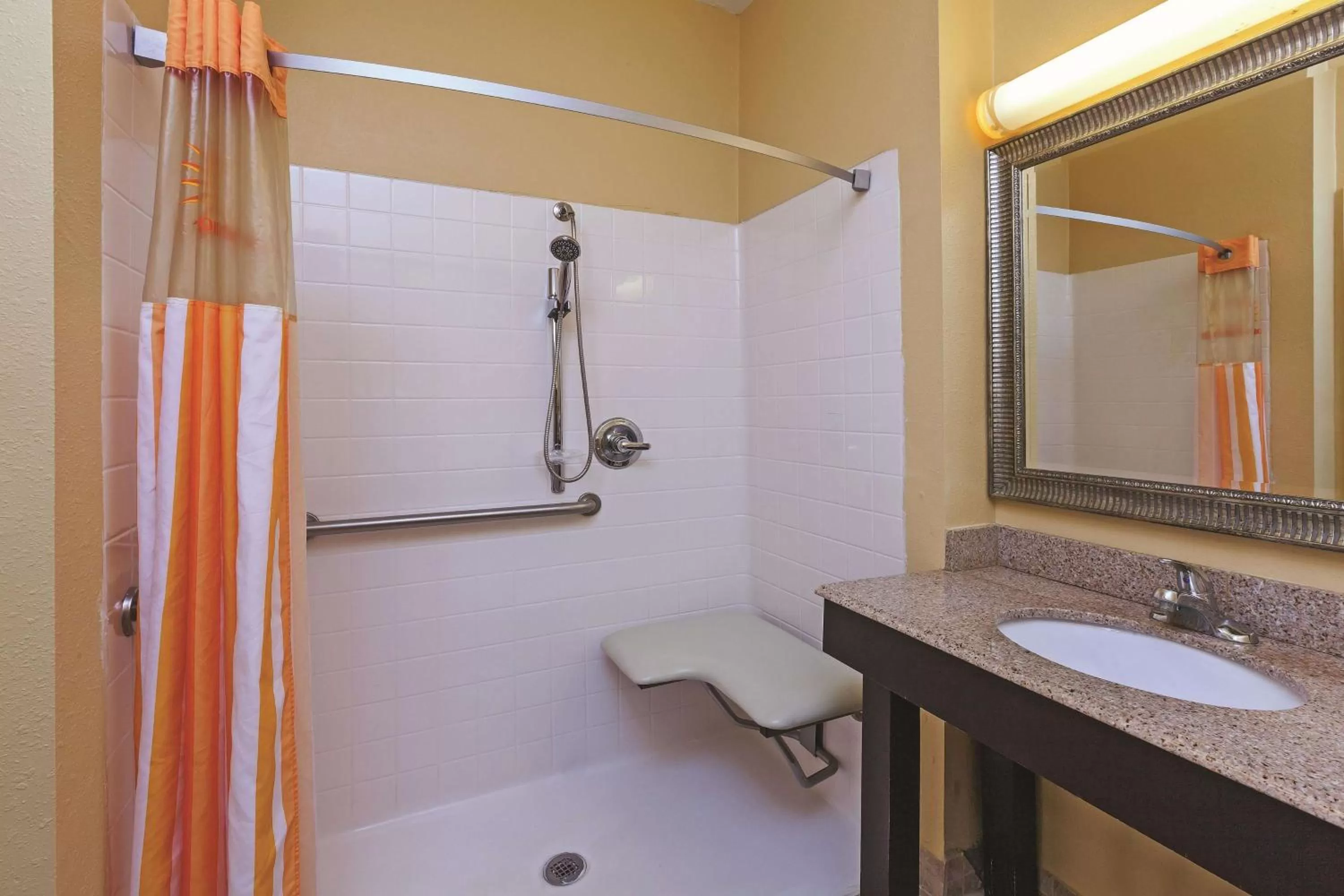 King Room with Roll-In Shower - Mobility/Hearing Accessible - Non-Smoking in La Quinta by Wyndham Angleton