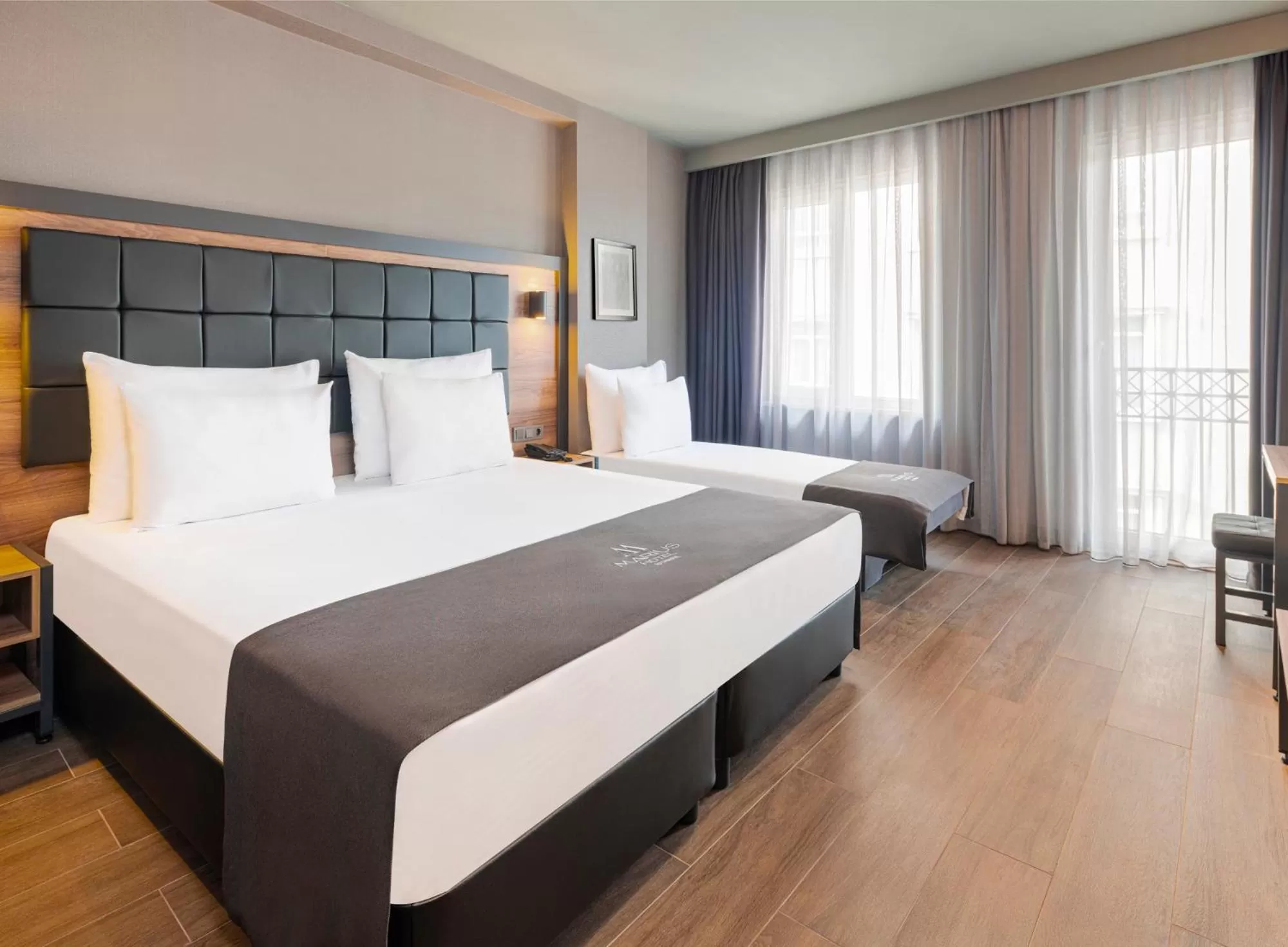 Deluxe Triple Room in Marius Hotel