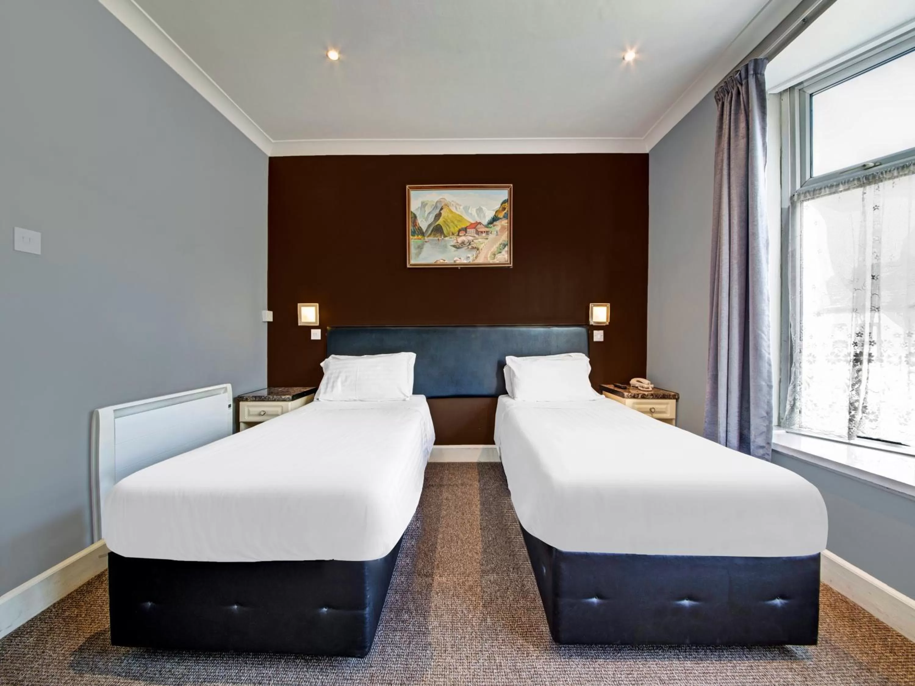 Standard Twin Room in OYO Bostons Manor Hotel