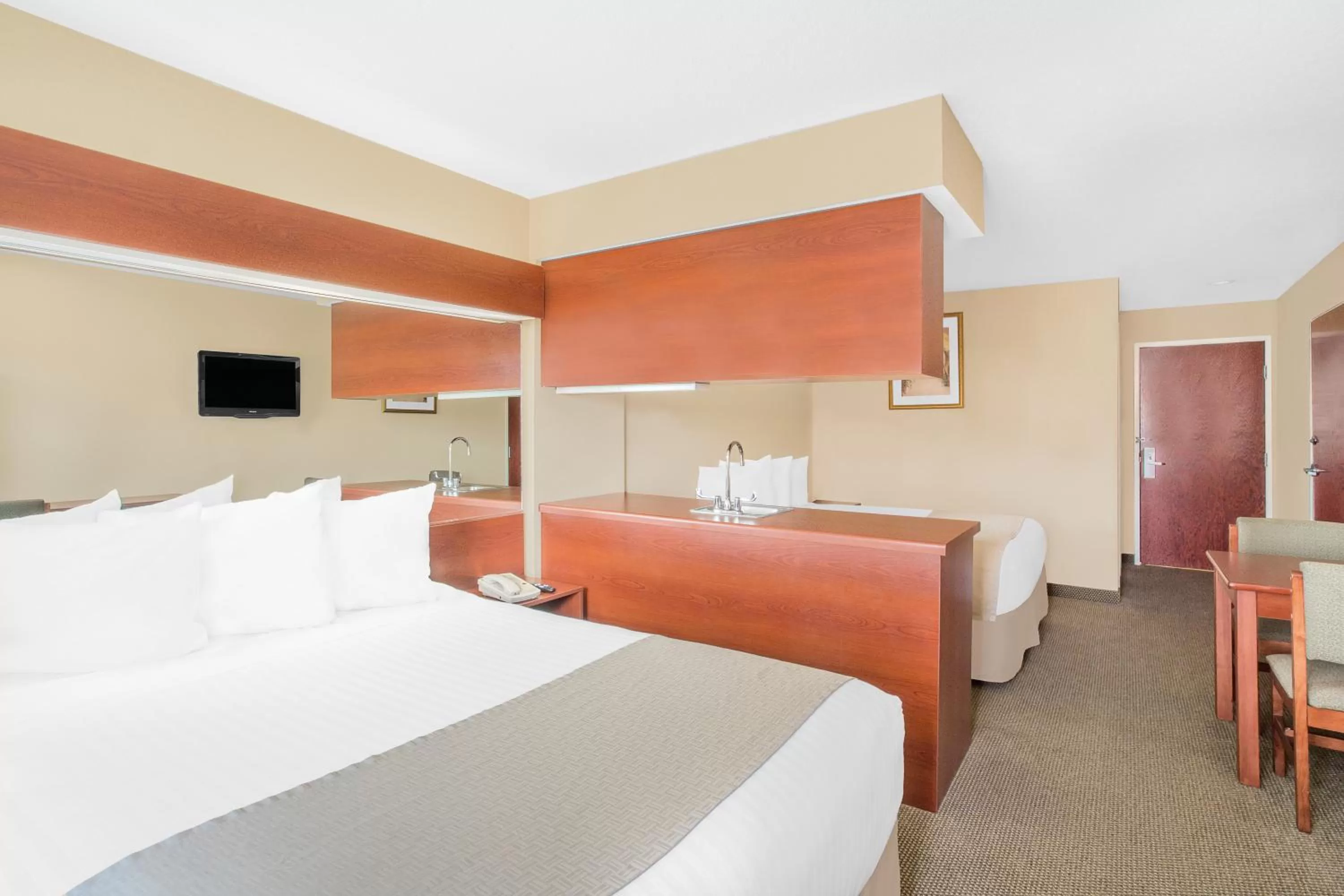 Deluxe Queen Room with Two Queen Beds - Disability Access - Non-Smoking in Microtel by Wyndham Bentonville