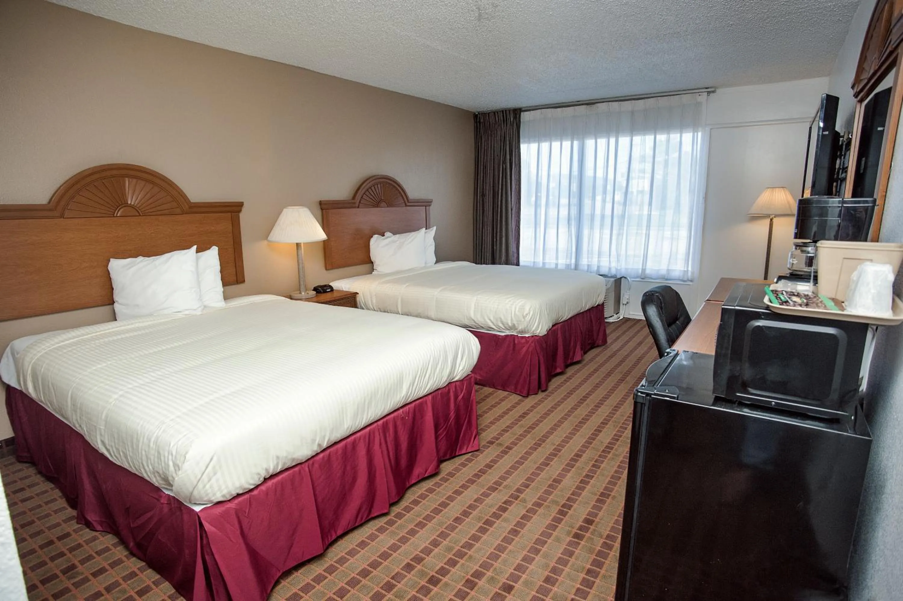Queen Room with Two Queen Beds - Smoking in Express Inn & Suites