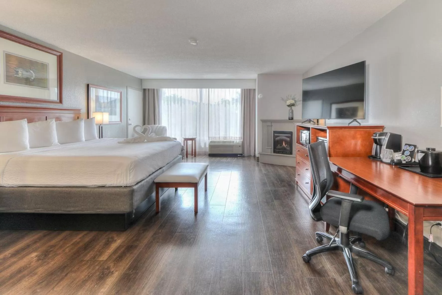 King Room Mini-Suite with Jacuzzi & Fireplace in The Ramsey Hotel and Convention Center