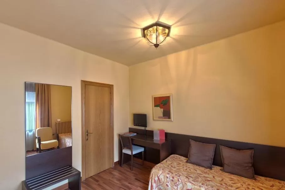 Quadruple Room (2 Adults + 2 Children) in Hotel Restaurant Pessets & SPA