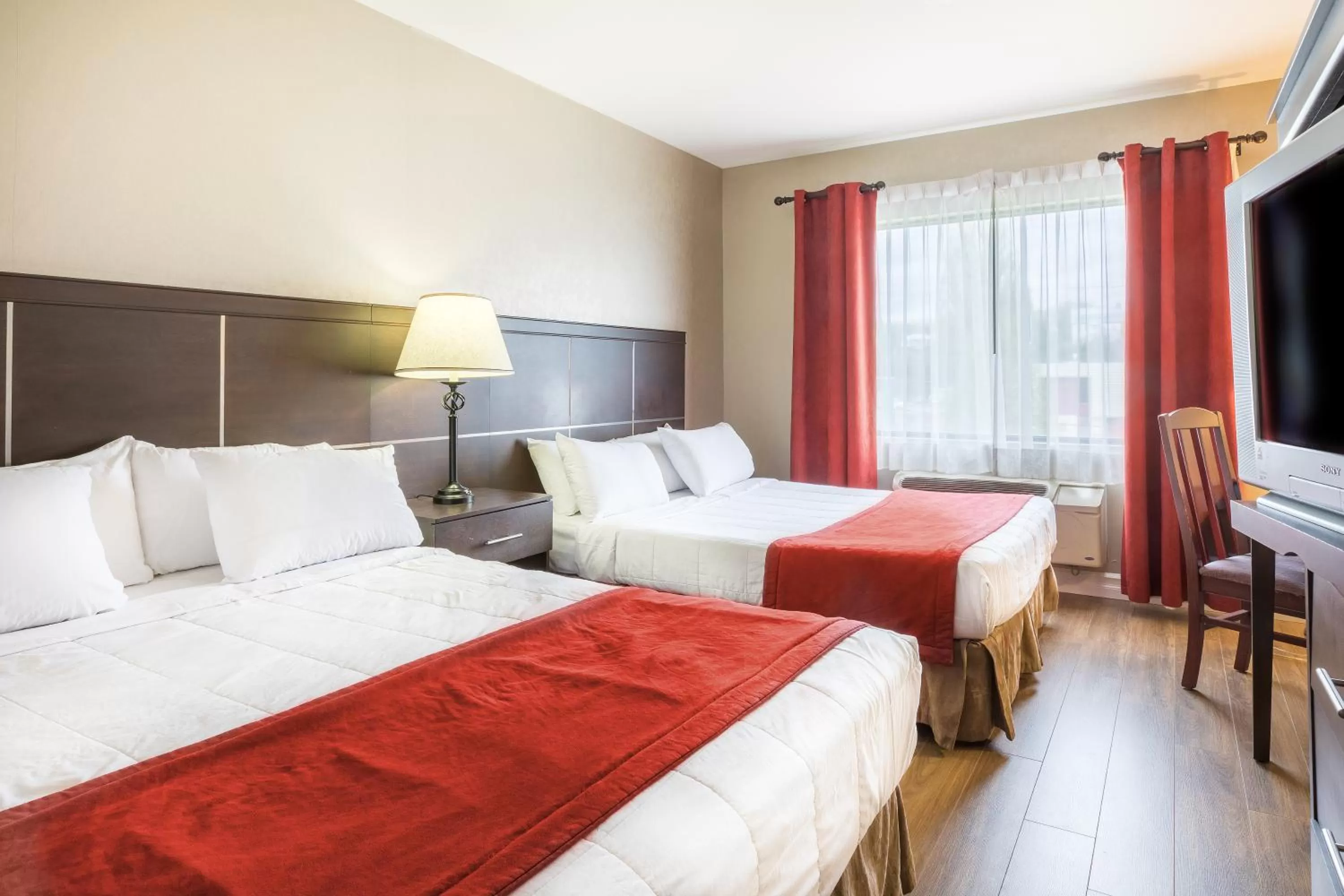 Economy Double Room with Two Double Beds in Hotel Ambassadeur et Suites