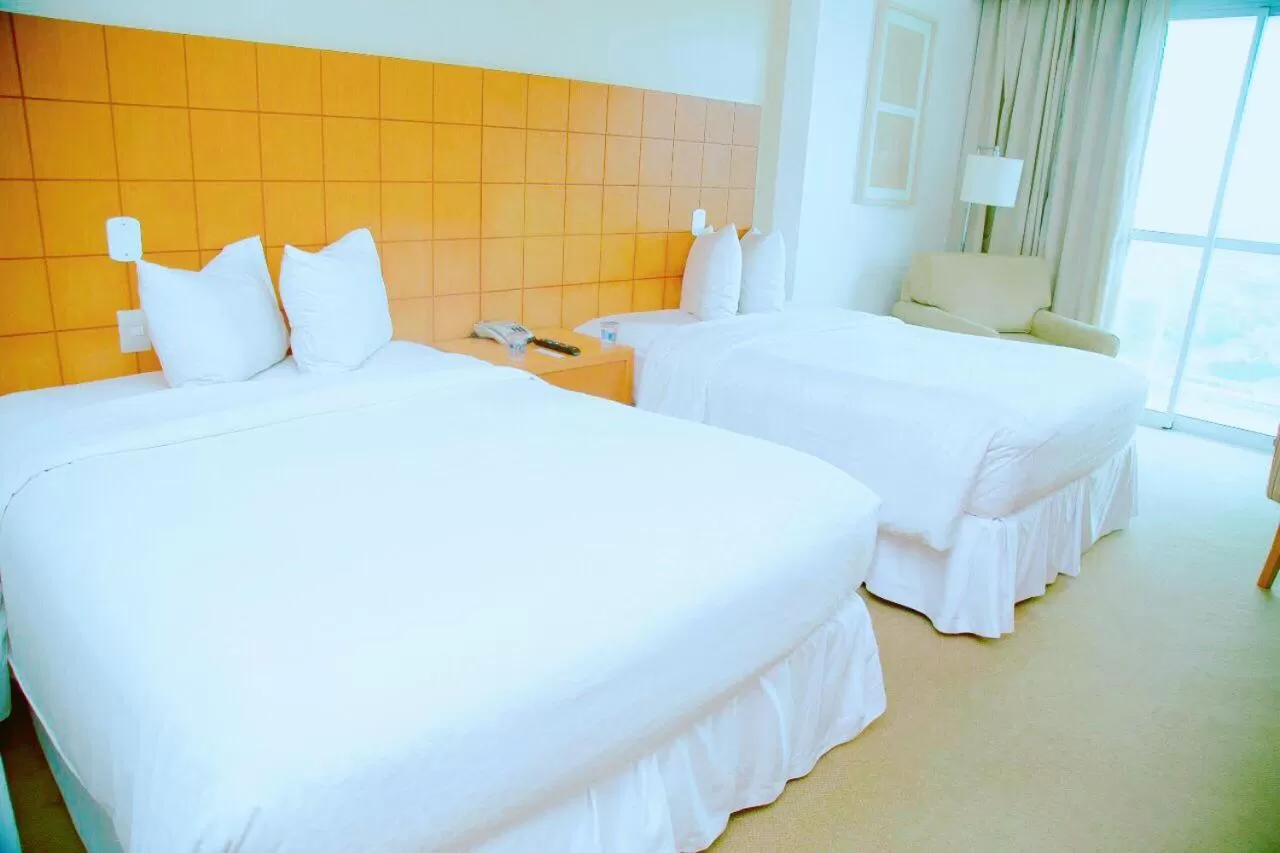 Standard Room with Two Double Beds in Mercure Macaé