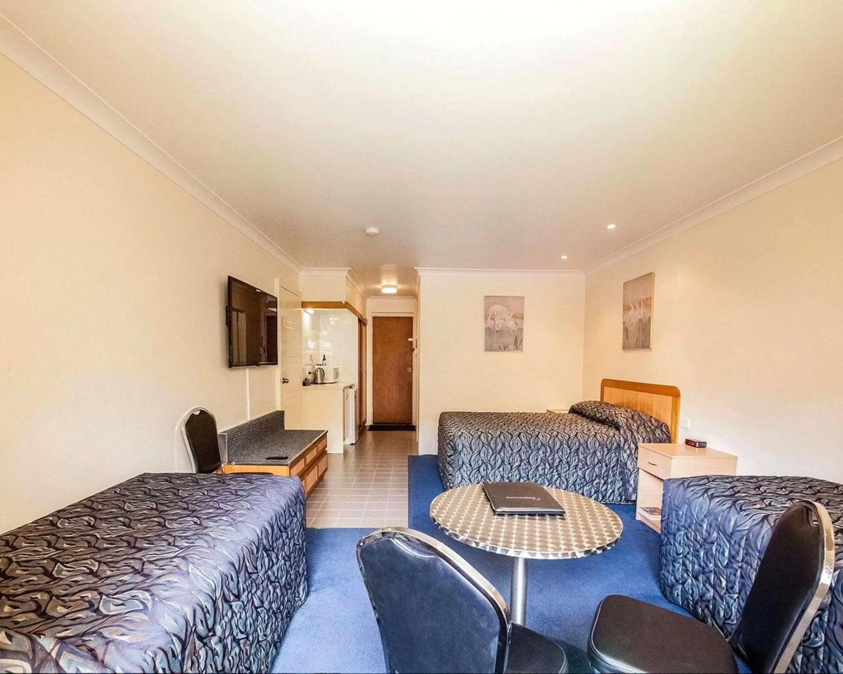 Family Room with One Queen Bed and Two Single Beds - Non-Smoking  in Comfort Inn Bay of Isles