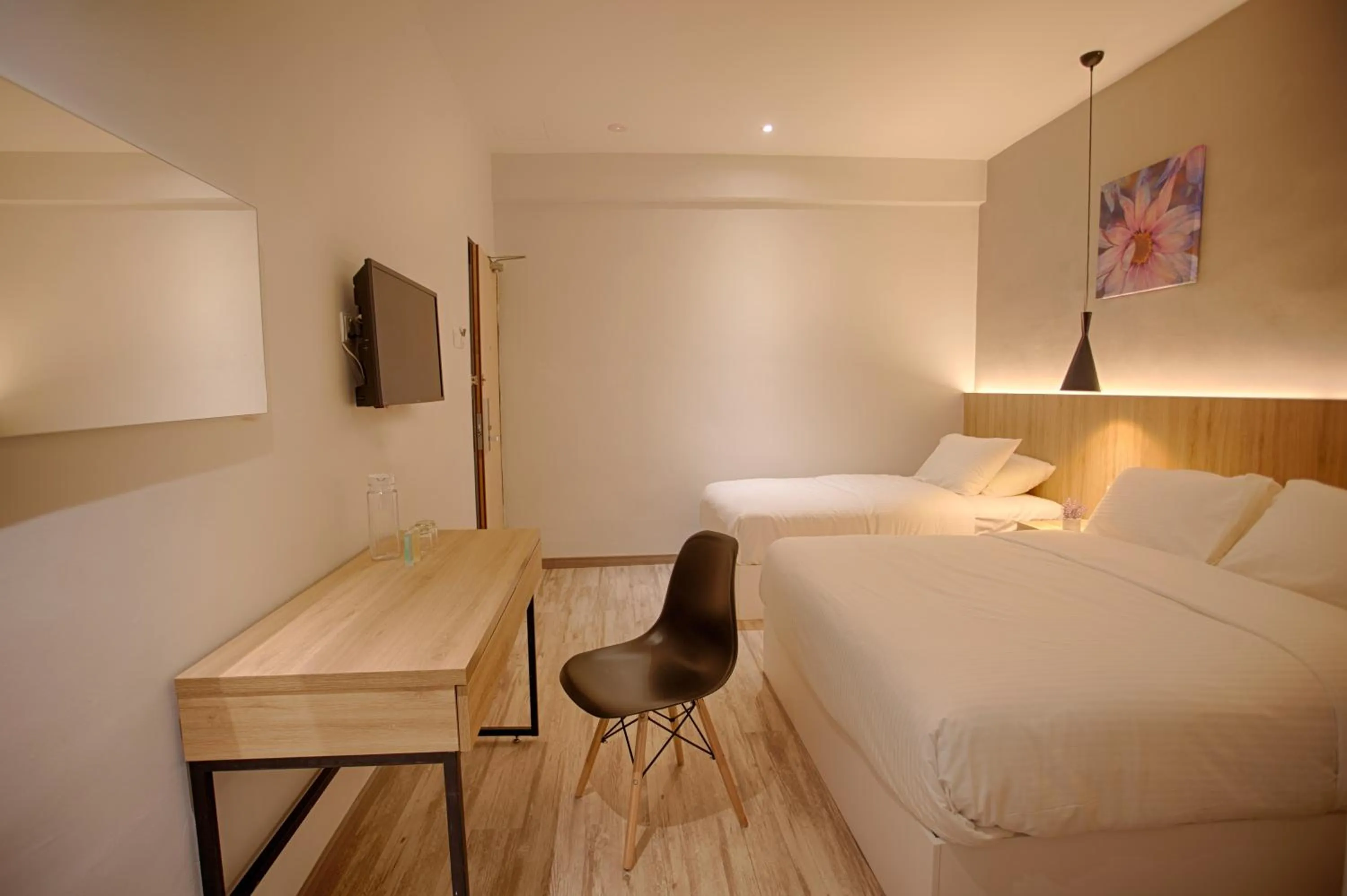 Deluxe Triple Room in The Marion Hotel