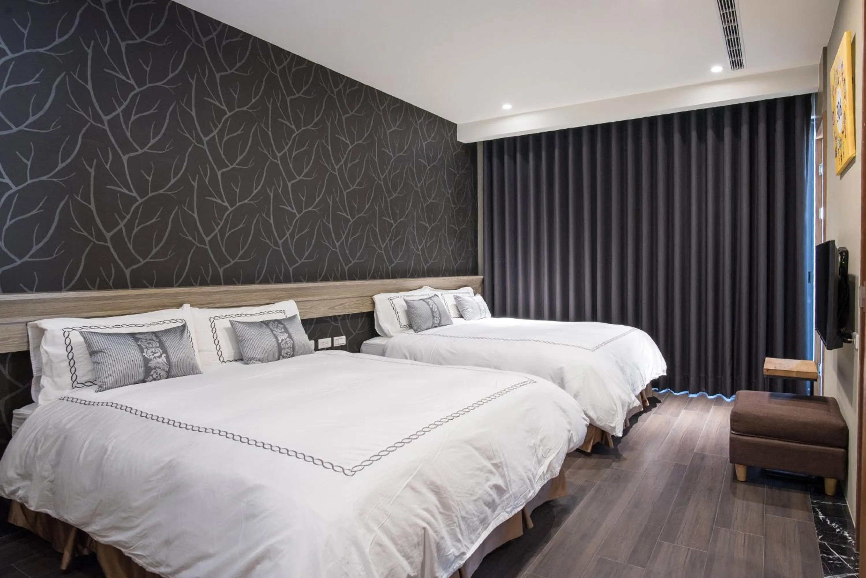 Deluxe Quadruple Room in Tianli Hotel