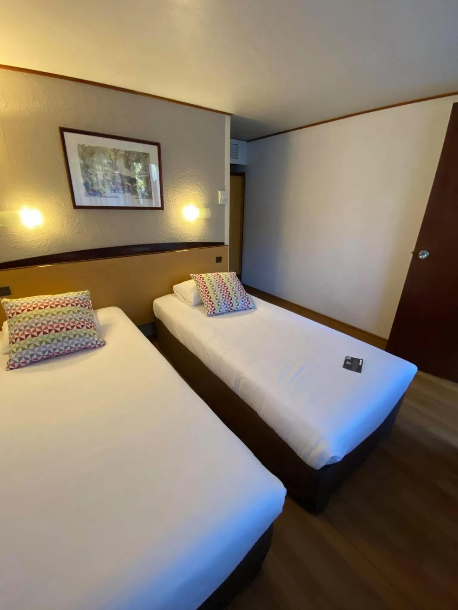 2 Single Beds  One Junior Bed (Up To One0 Years) in Campanile Manosque