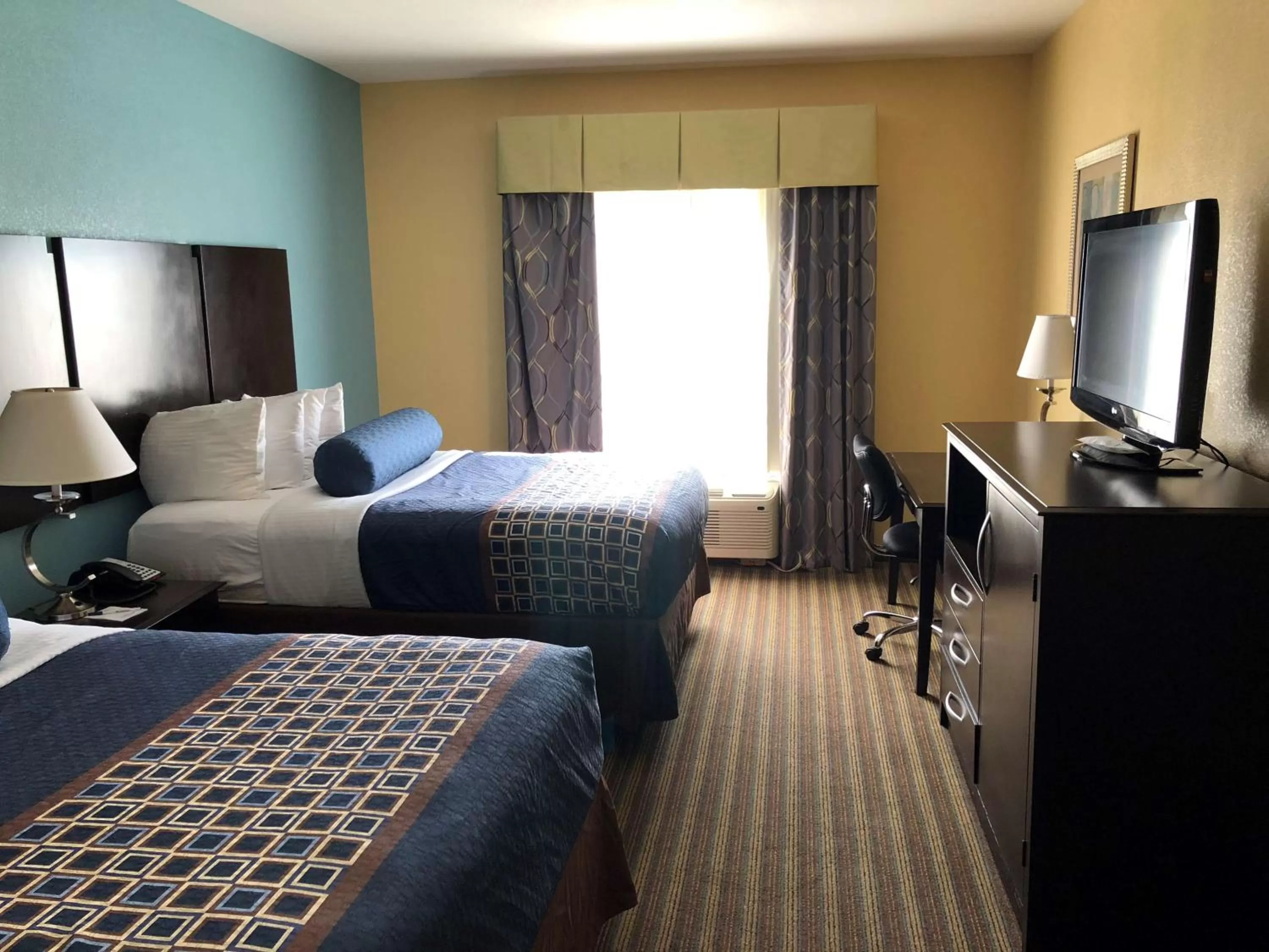 King Room with Two King Beds - Non-Smoking in Best Western Plus Goodman Inn & Suites