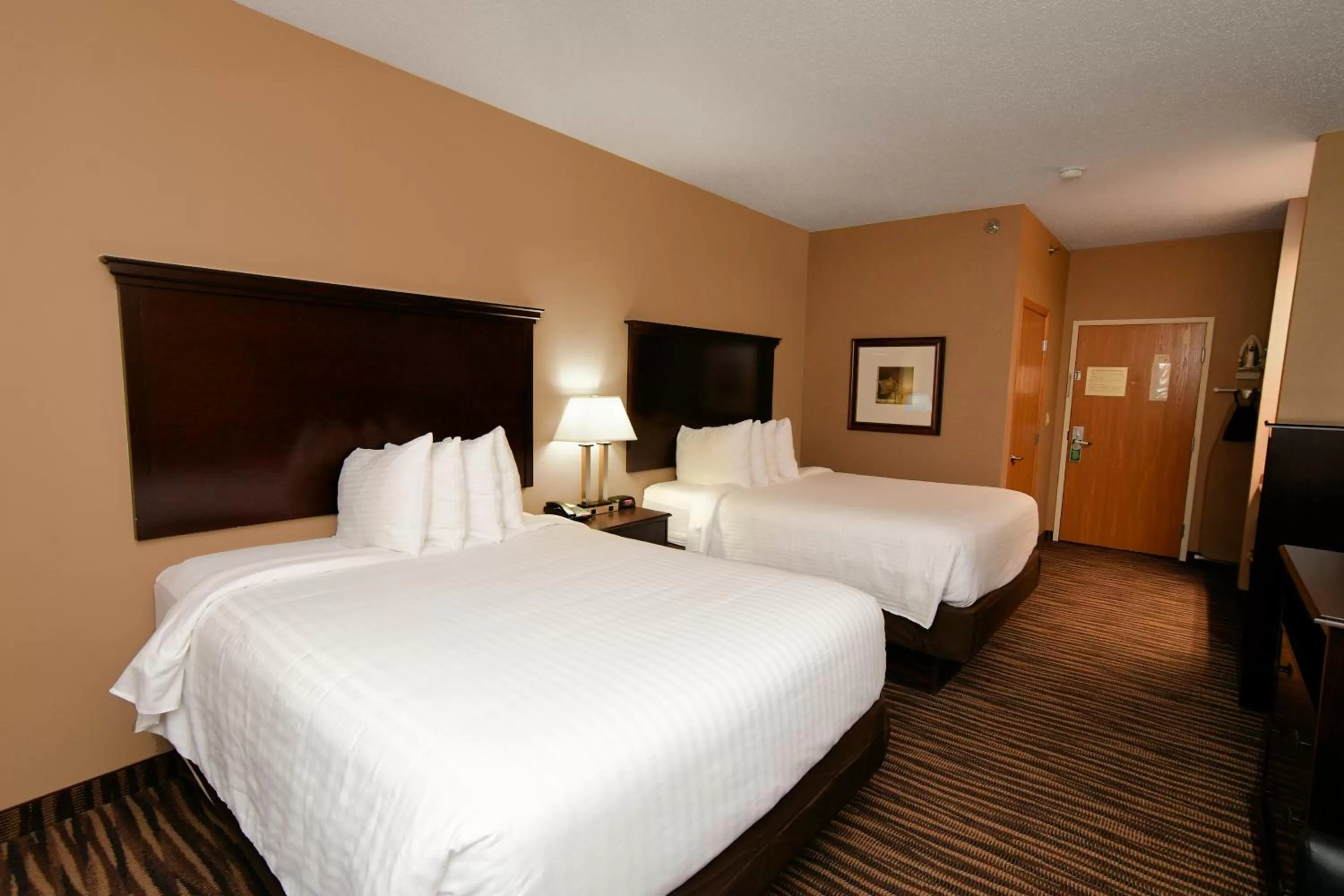 Queen Room with Two Queen Beds - Non-Smoking in Cobblestone Inn & Suites - Denison | Majestic Hills