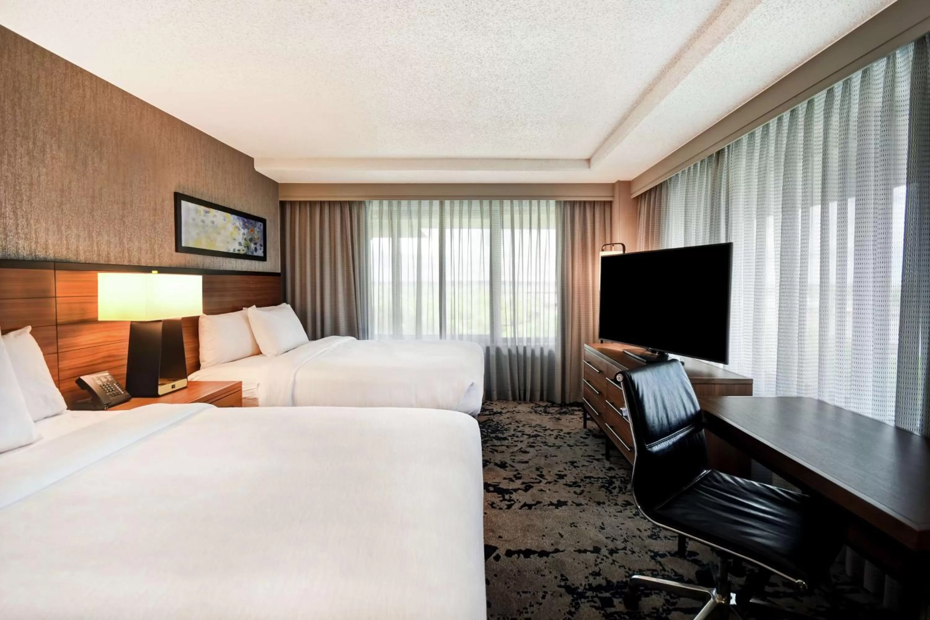 Corner Suite with Two Queen Beds in Embassy Suites by Hilton Omaha Downtown Old Market