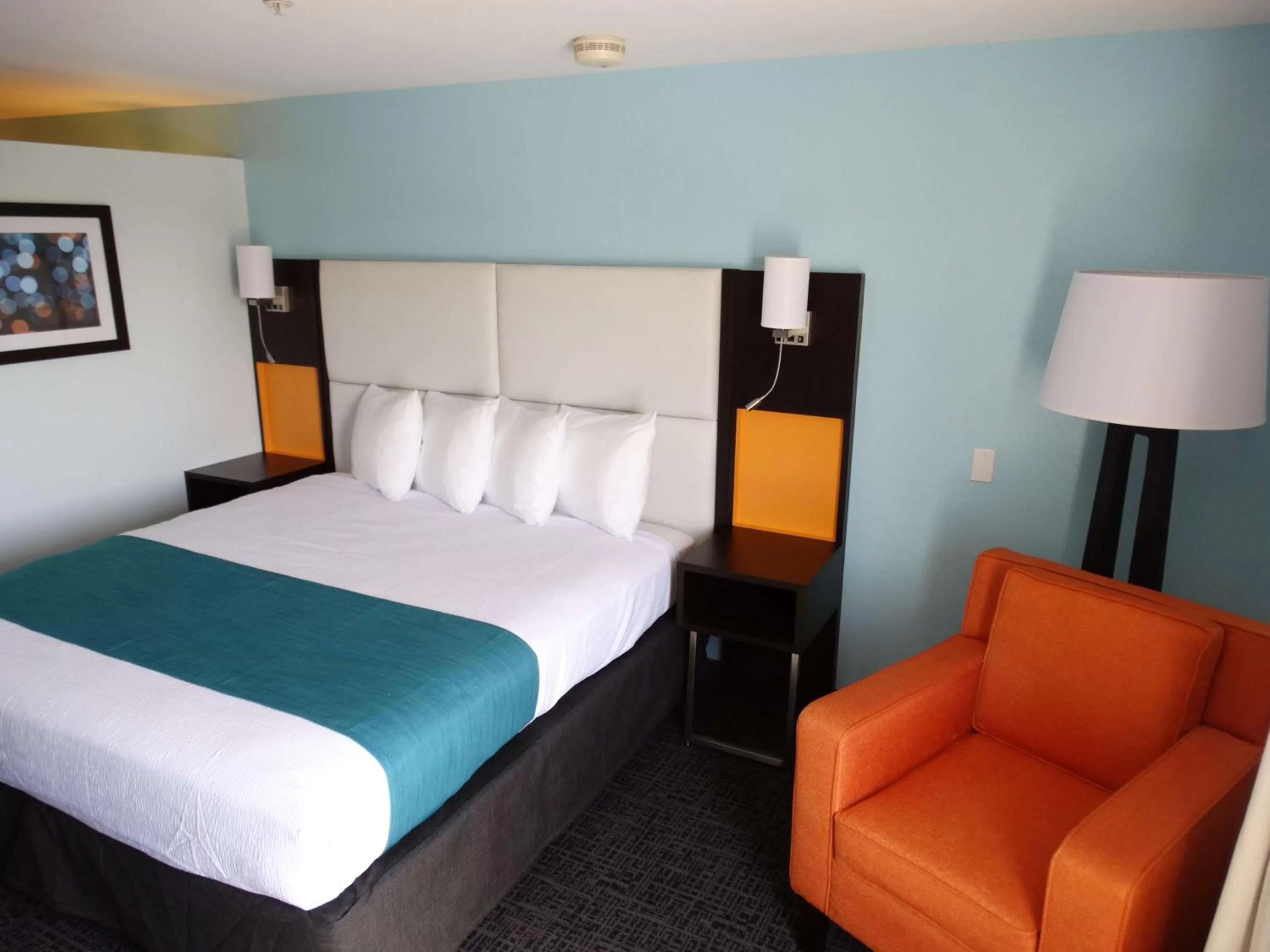 Family Room with One King Bed and Twin Beds in Best Western Plus Orlando Lake Buena Vista South Inn & Suites