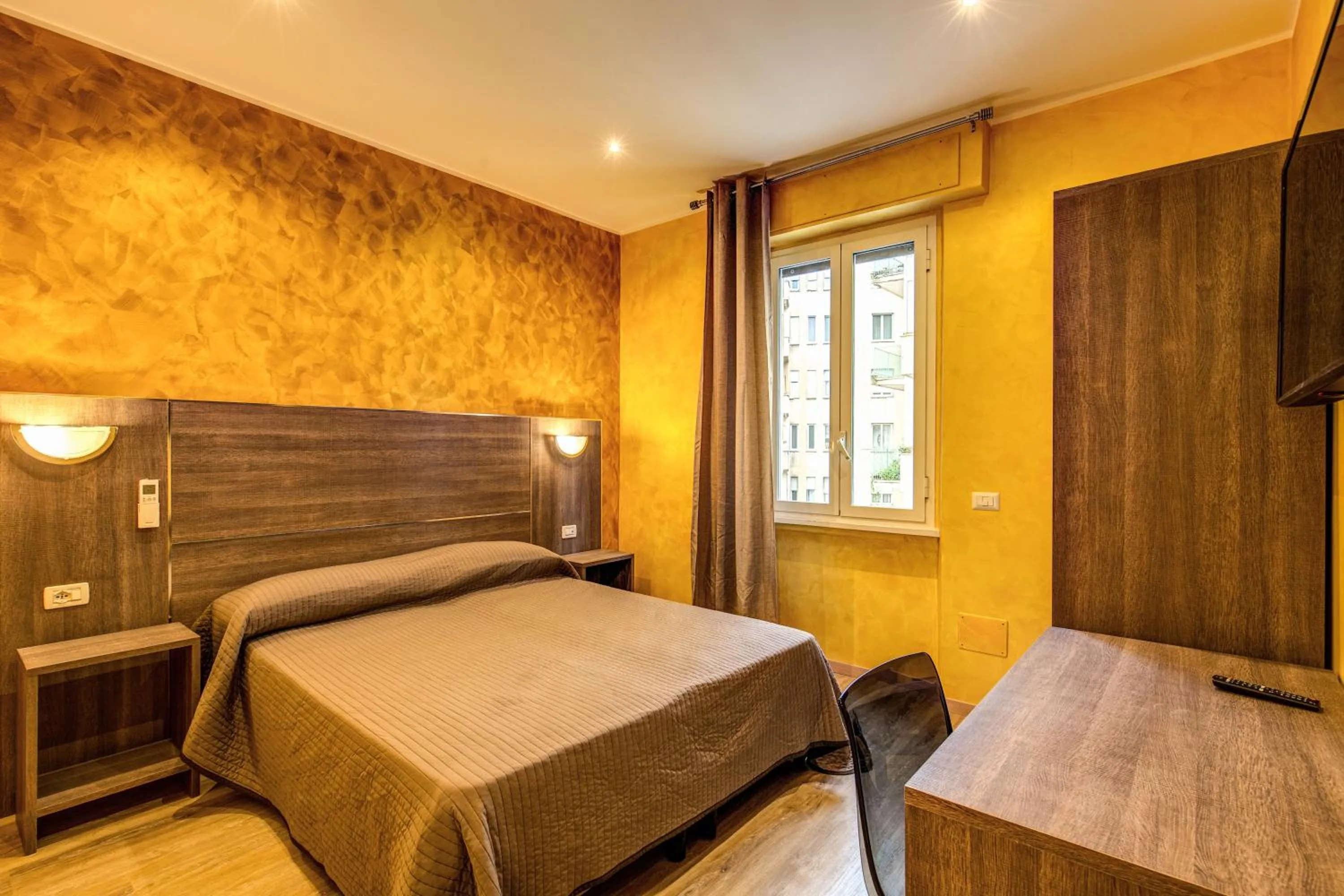 Bed in Hotel Osimar