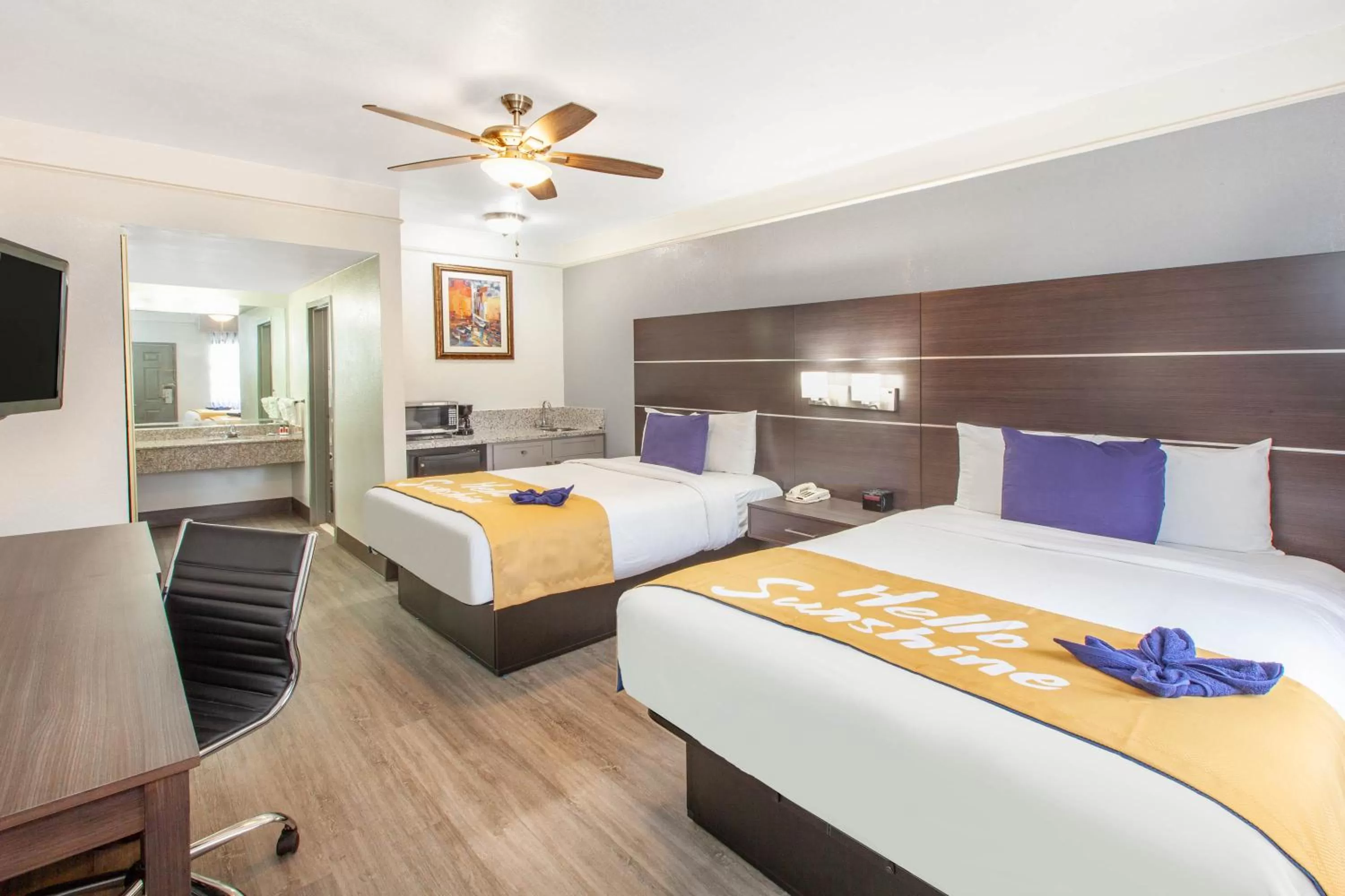 Queen Room with Two Queen Beds with Spa Bath 1st Floor- Smoking in Days Inn & Suites by Wyndham Webster NASA-ClearLake-Houston