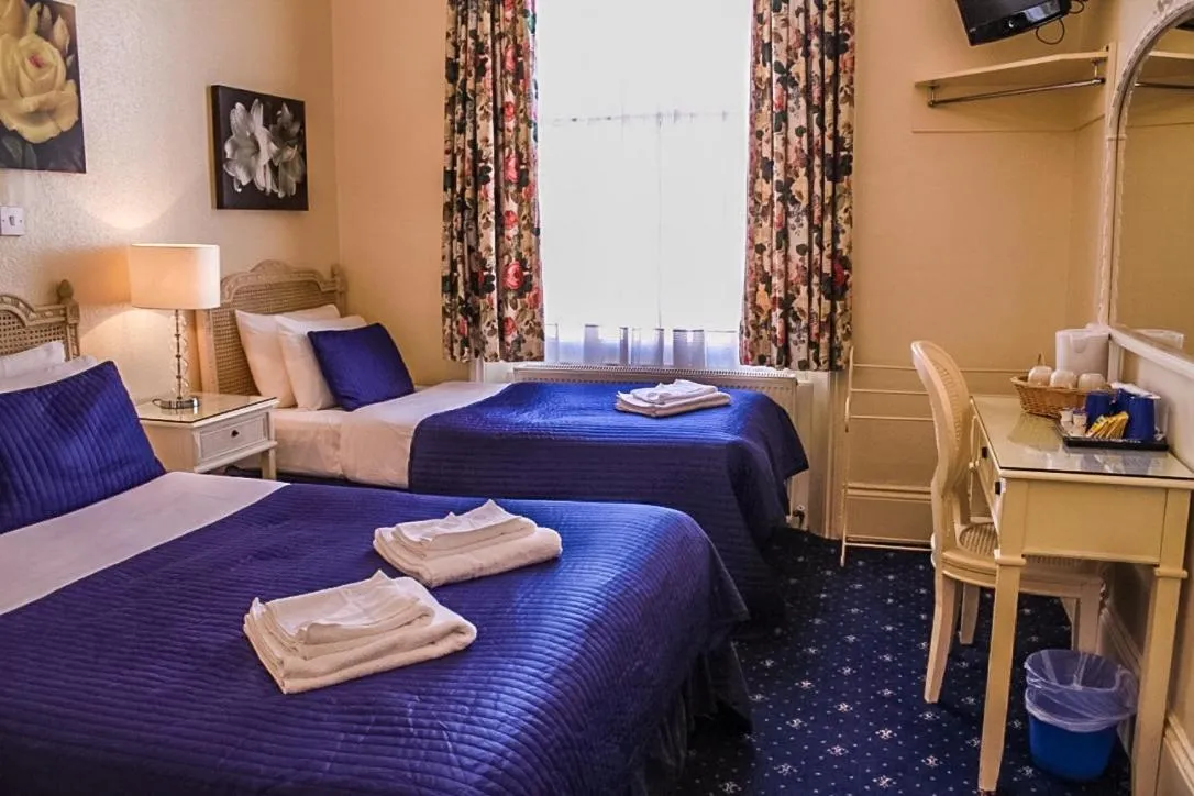 Bed in Blades Hotel