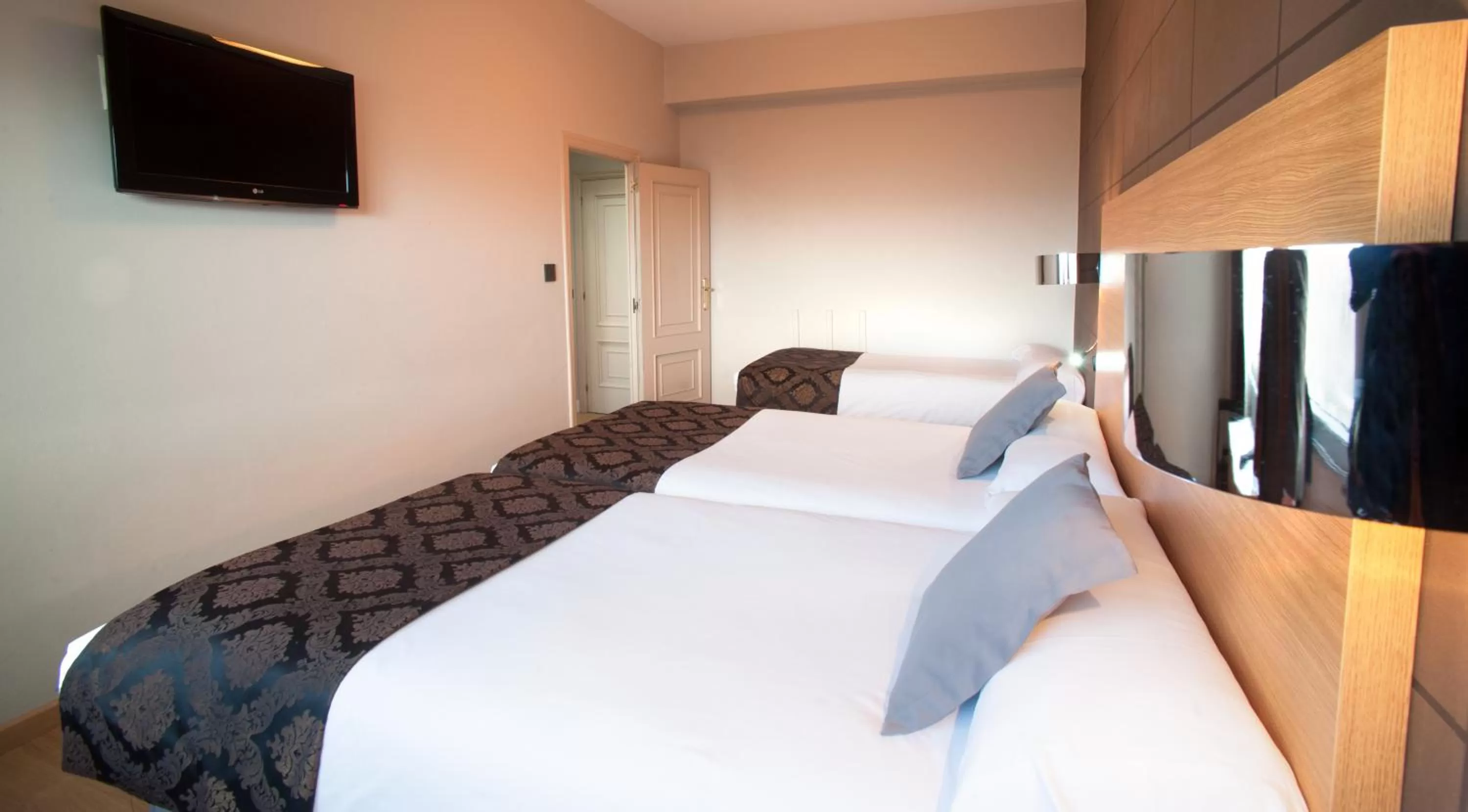 Triple Room in Hotel Universal