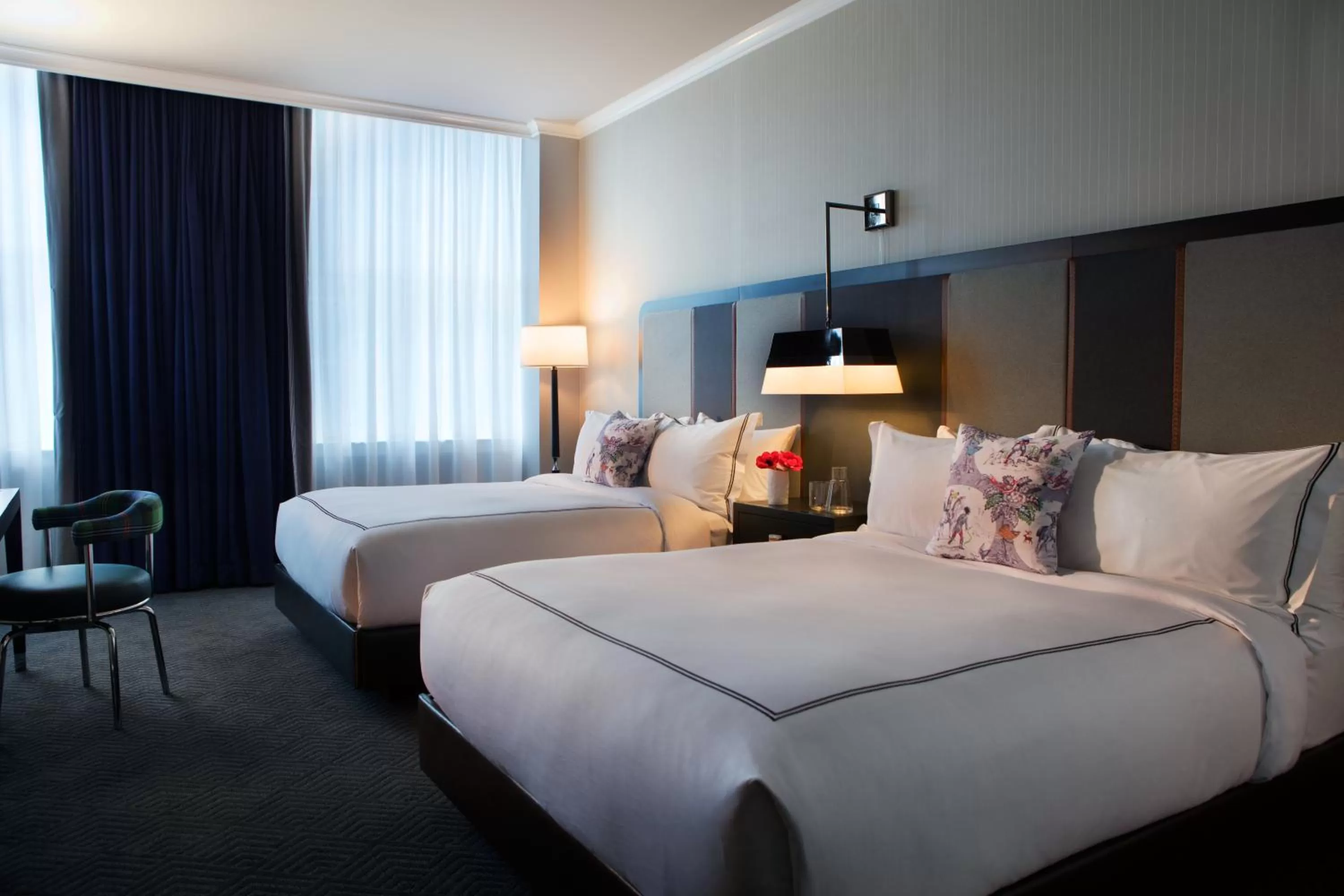 Queen Room with Two Queen Beds and Mobility Accessible Tub in Kimpton Cardinal Hotel by IHG