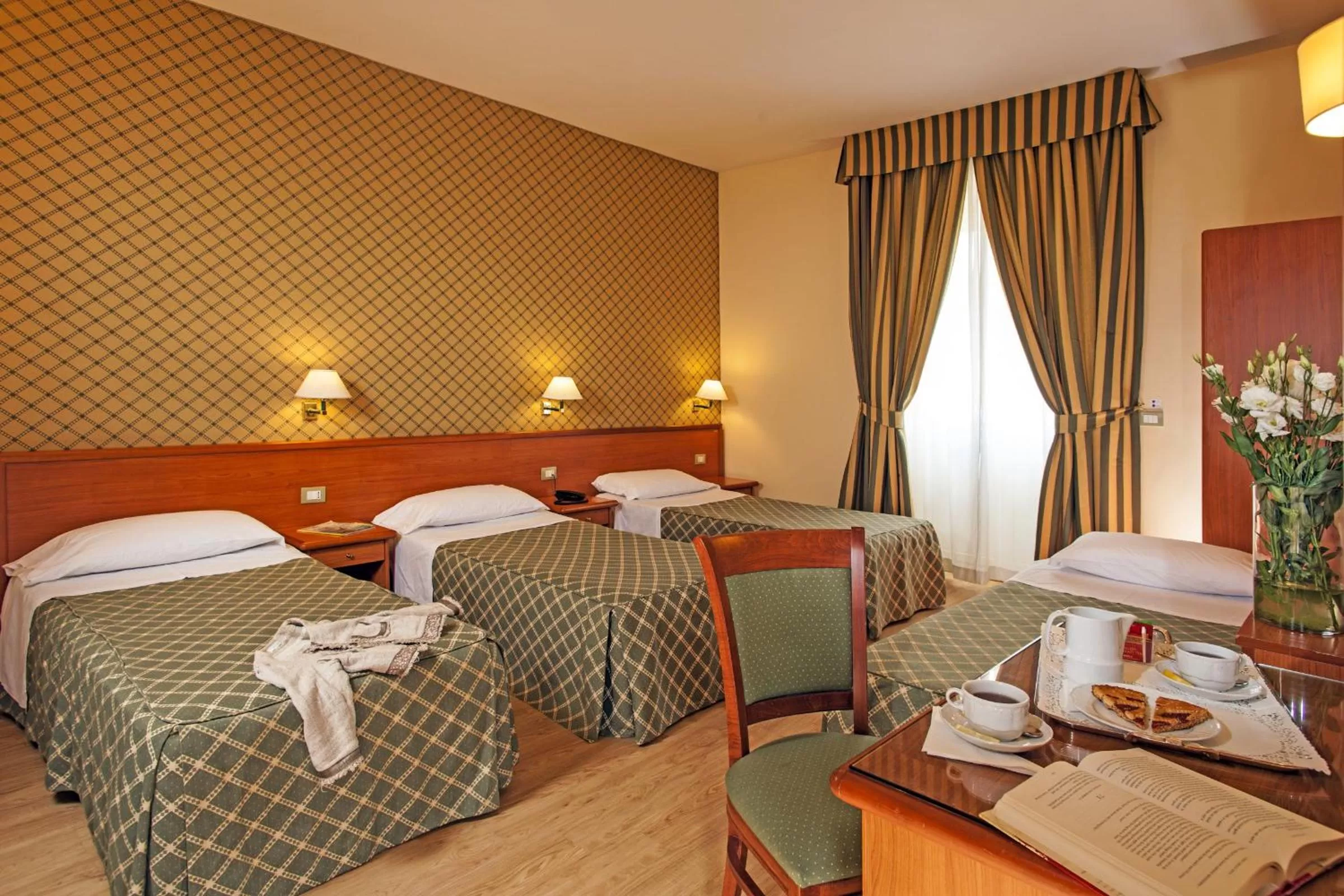 Quadruple Room in Hotel Colosseum