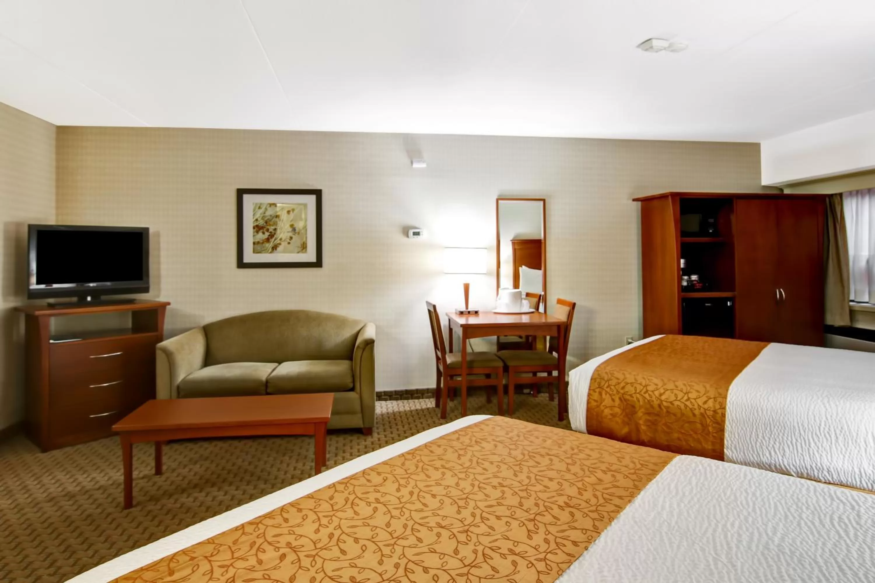 Queen Room with Two Queen Beds and Sofa Bed- Non-Smoking in Quality Inn