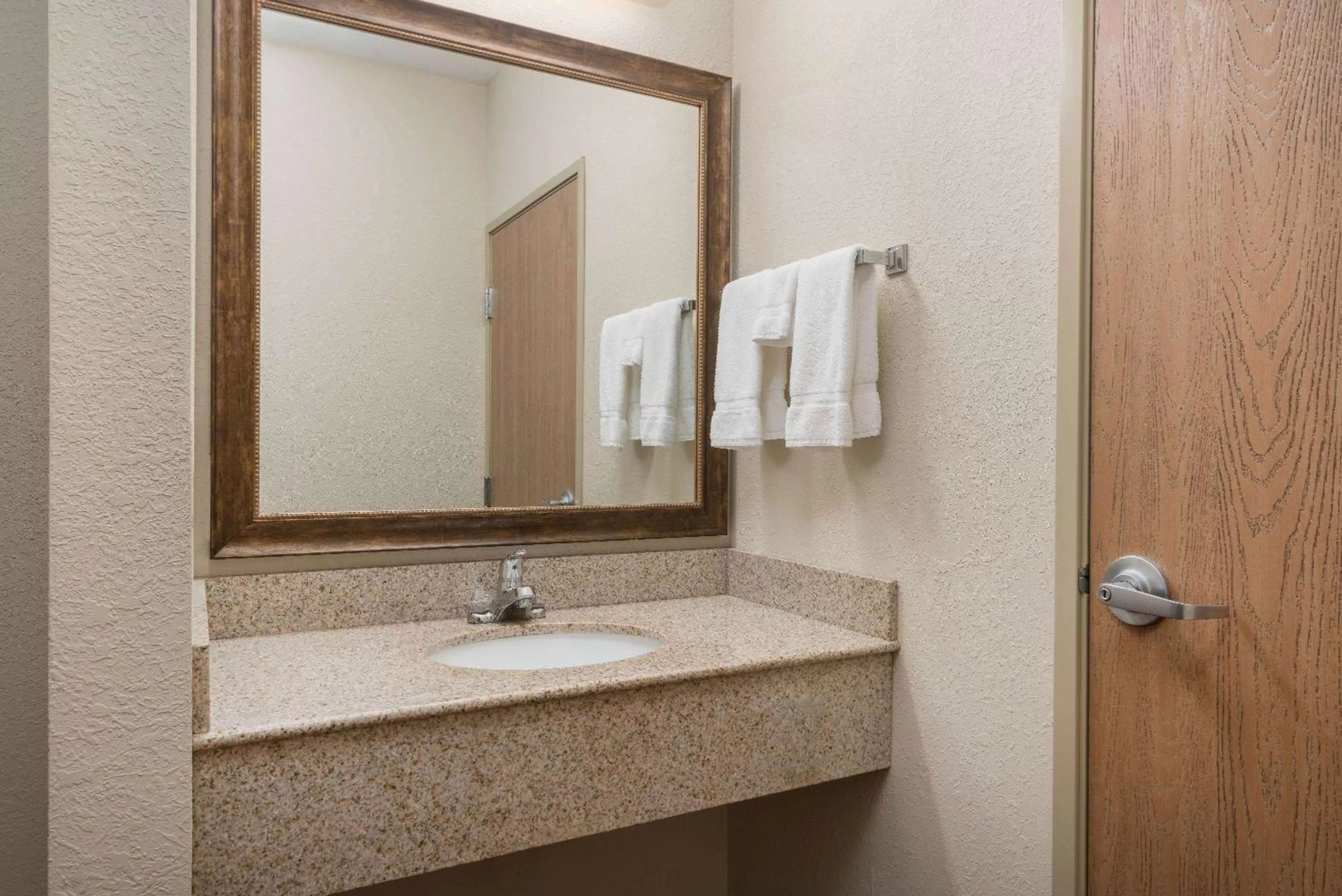 King Suite with Roll-in Shower - Mobility Access/Non-Smoking in AmericInn by Wyndham Anamosa