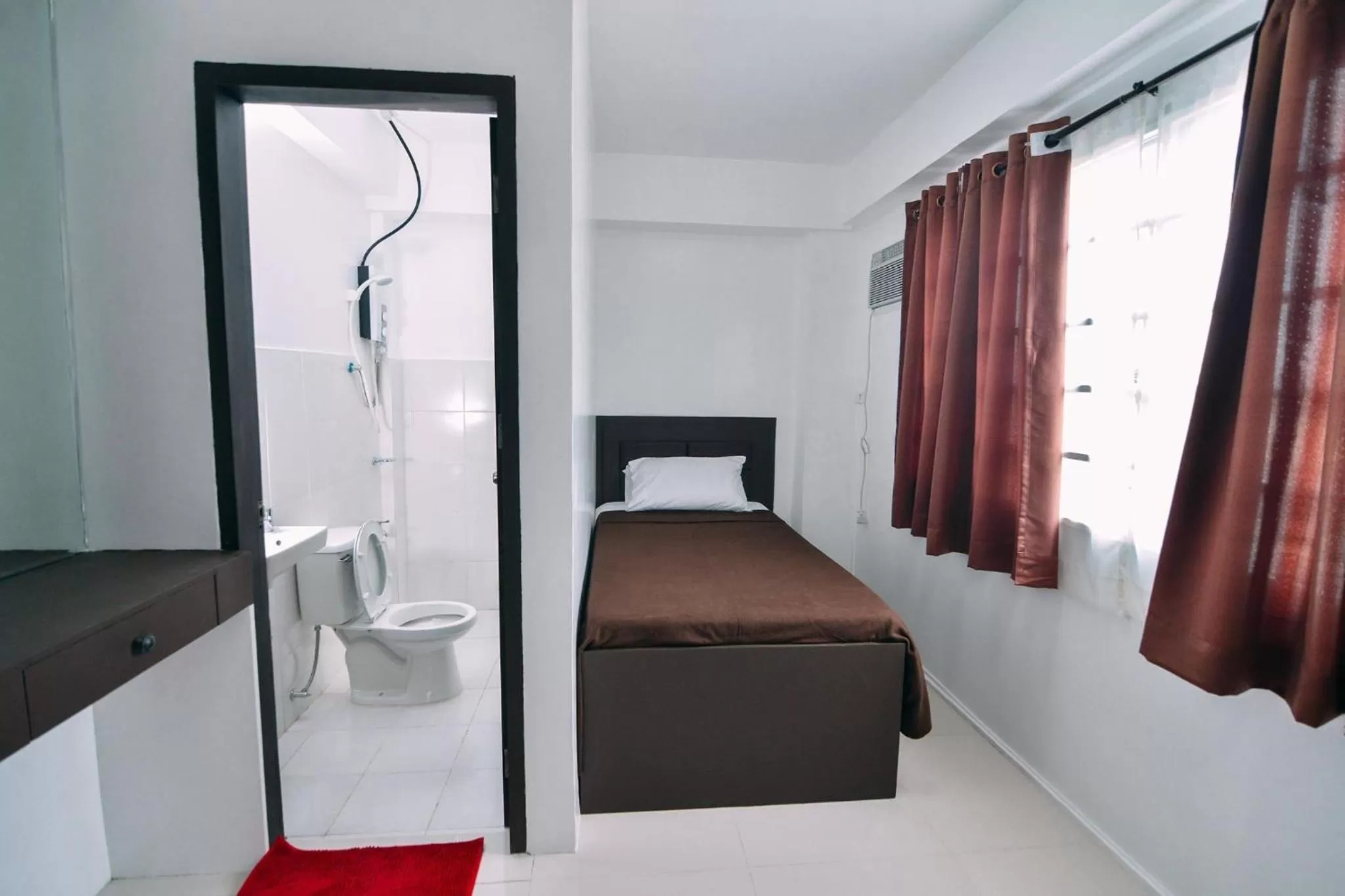 Studio Single in The Strand Suites and Dormitel