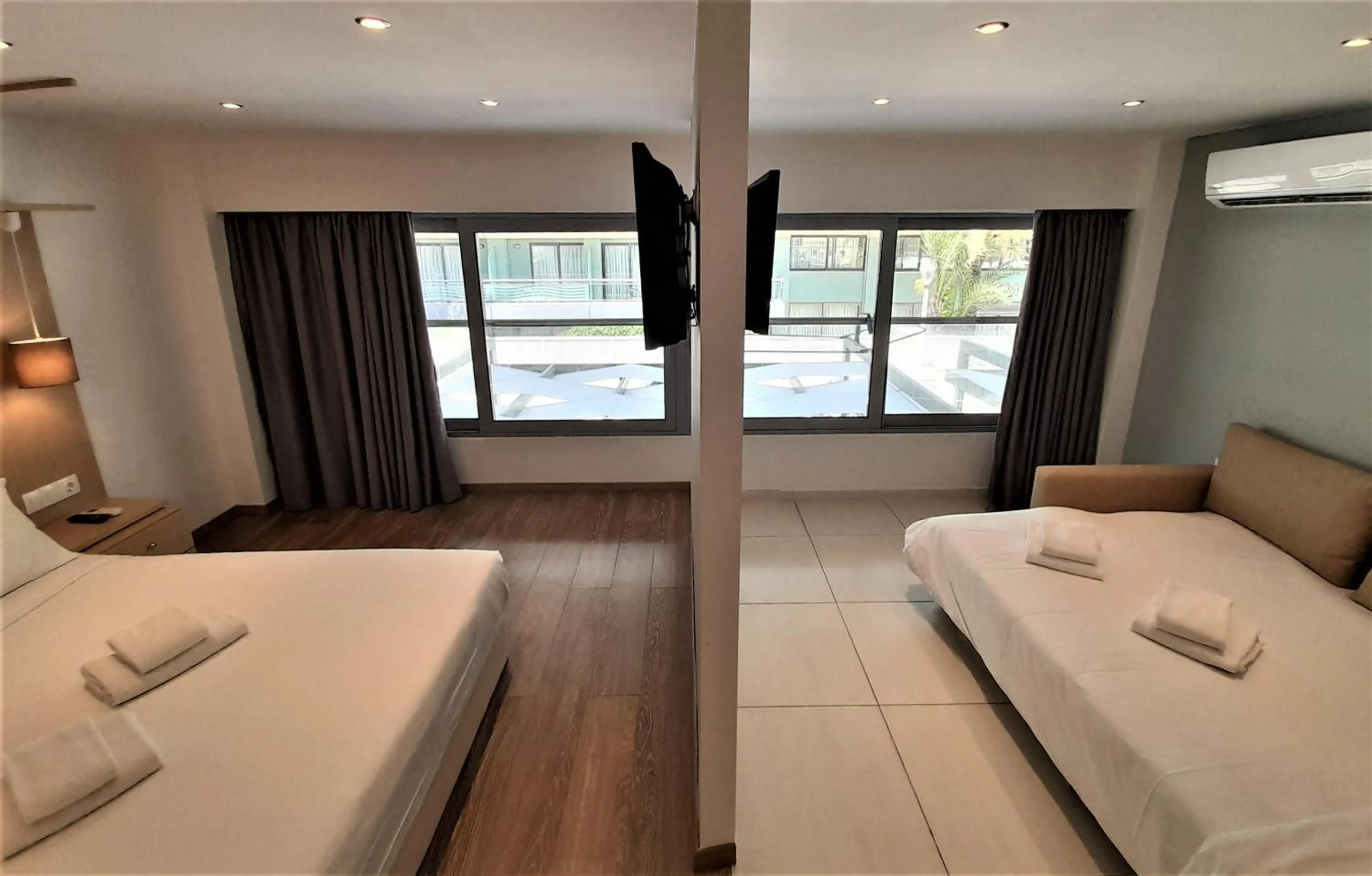 Quadruple Room in Elite Hotel