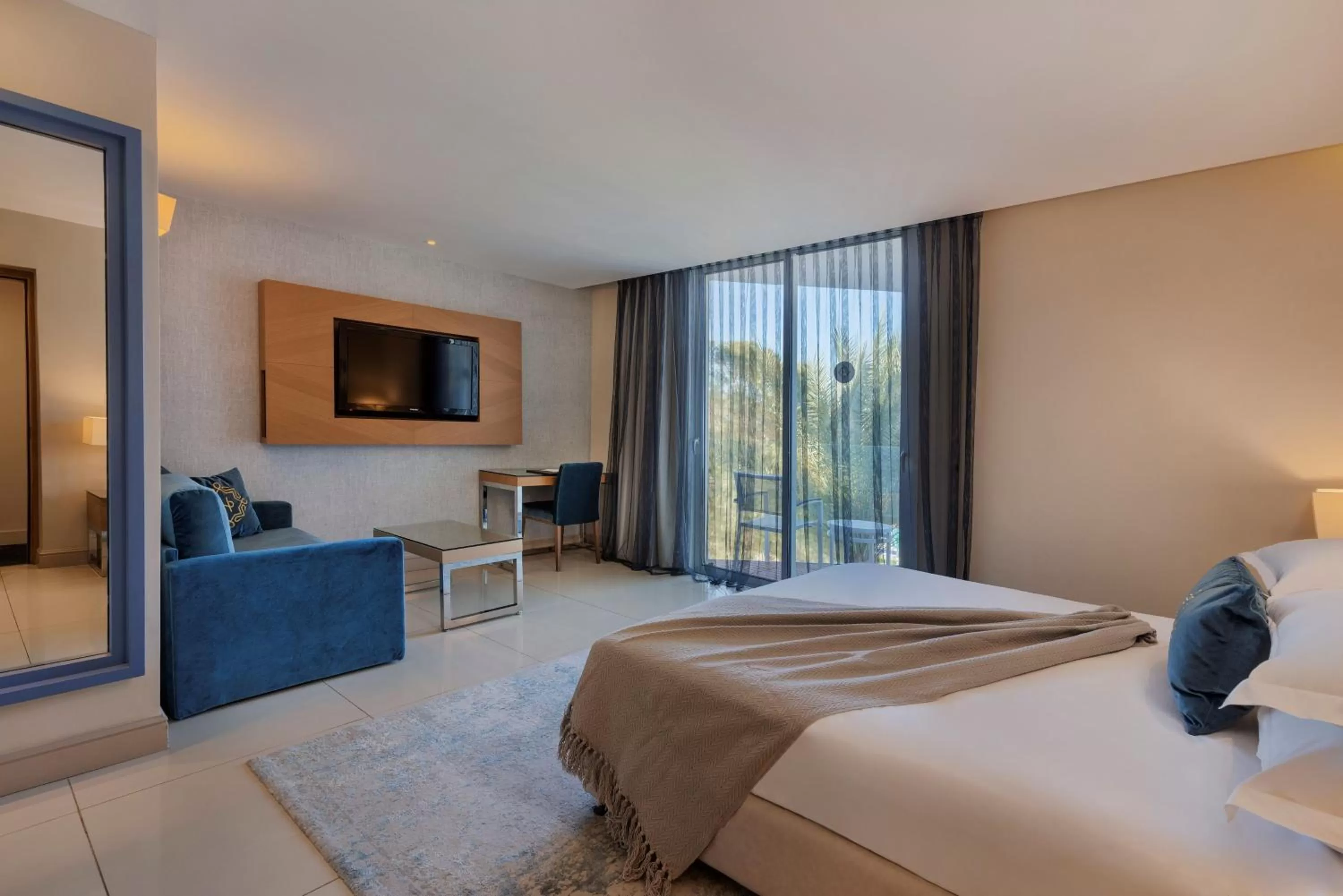 Living room, Bed in Herbert Samuel The Reef Eilat