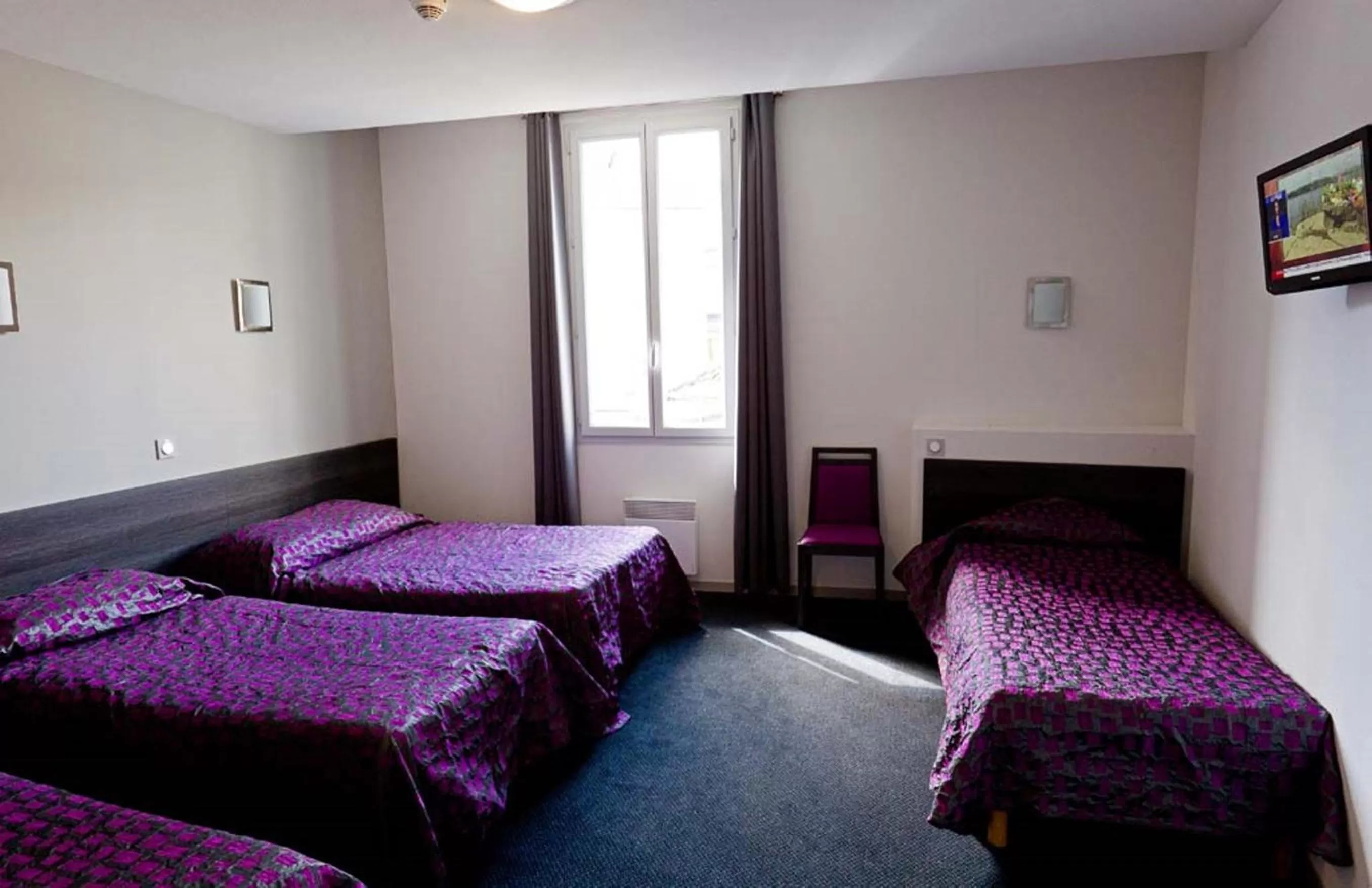 Quadruple Room in Hôtel Saint Etienne