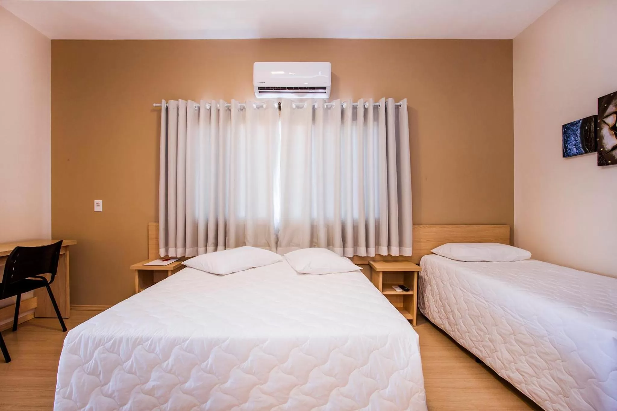 Superior Triple Room with 1 double bed and 1 single bed in Hotel Metrópole Paulínia