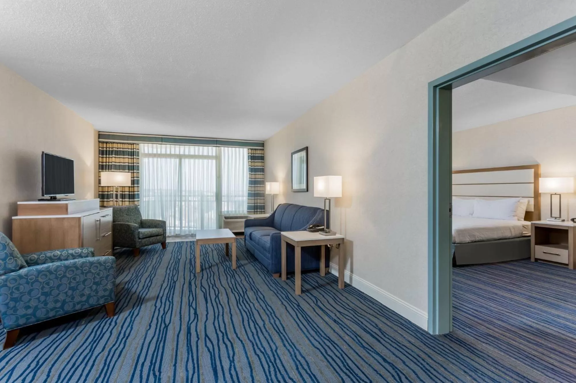 Coastal Two Bedroom Suite 1 King Bed, 2 Queens Bed, Sofa Bed in Wyndham Virginia Beach Oceanfront