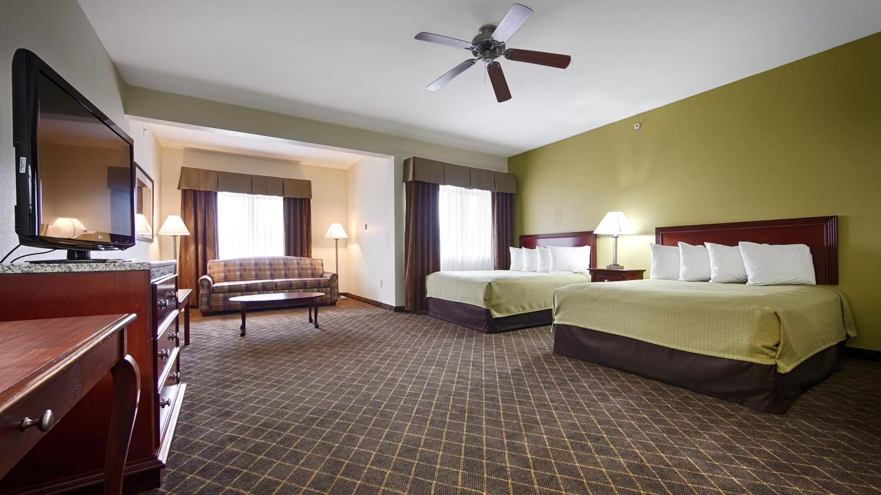 Queen Room with Two Queen Beds with Sofa Bed in Best Western Geneseo Inn