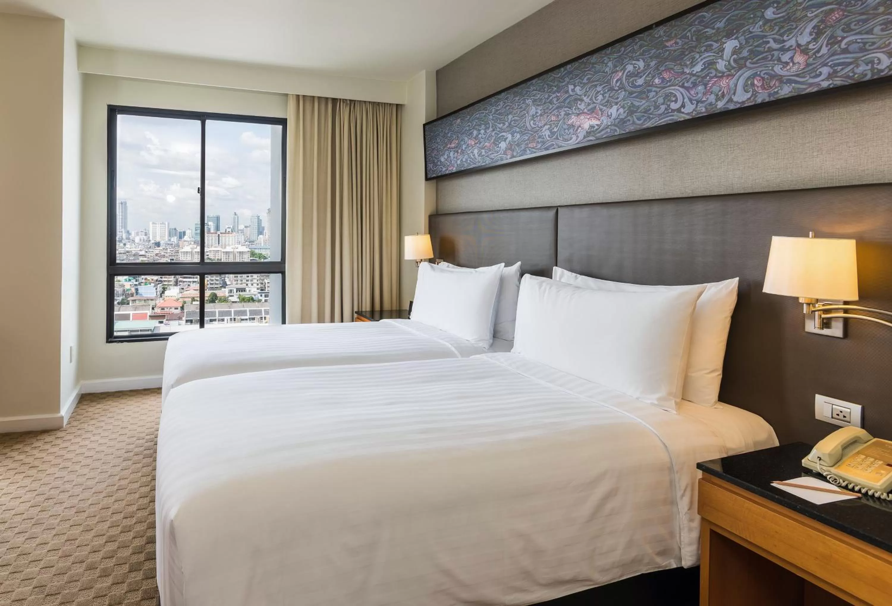 Grand Deluxe One-Bedroom Twin in Chatrium Sathon Bangkok