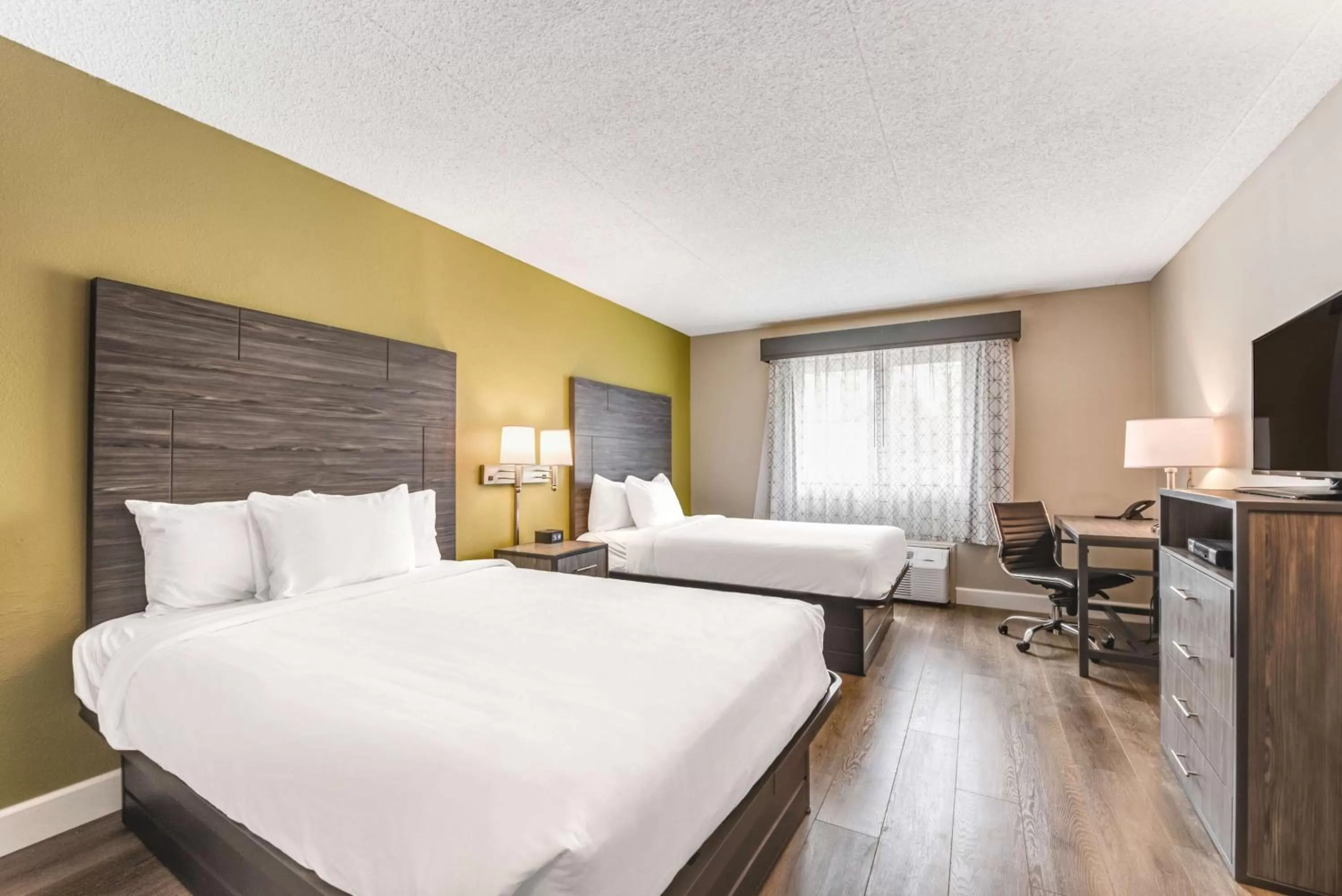 Double Room with Two Double Beds and Bath Tub - Disability Access in SureStay Plus Hotel by Best Western McGuire AFB Jackson